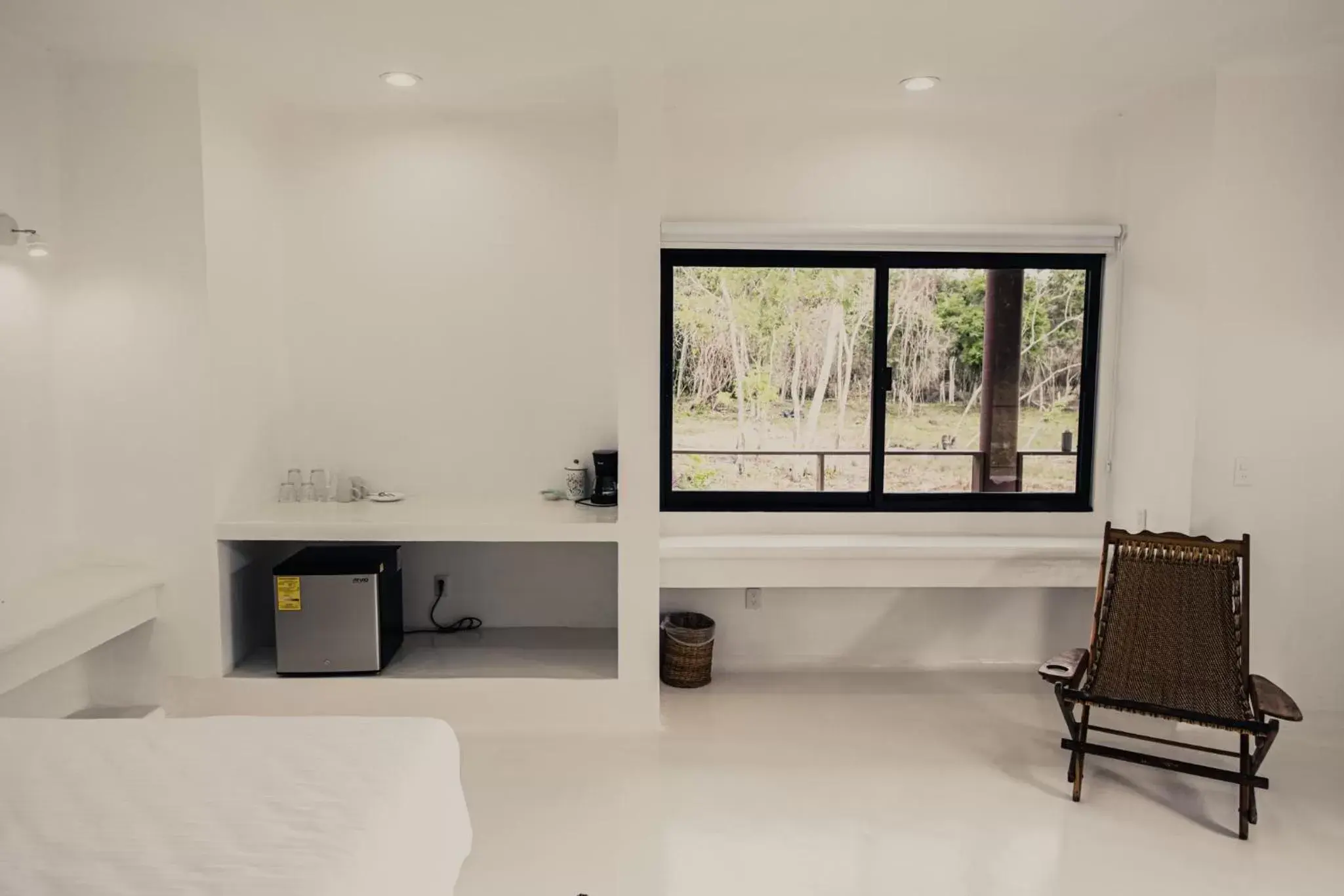 Seating area, TV/Entertainment Center in Royal Palm Bacalar Cabañas & Lagoon Club