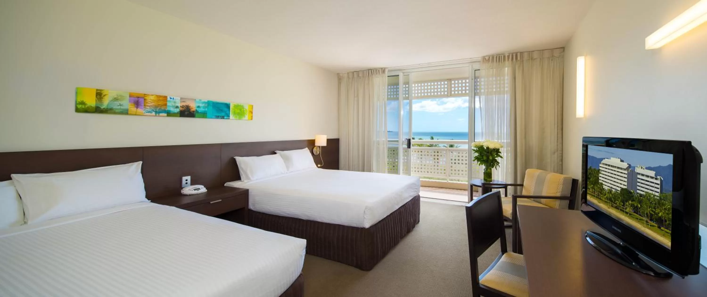 Photo of the whole room, Bed in Cairns Harbourside Hotel