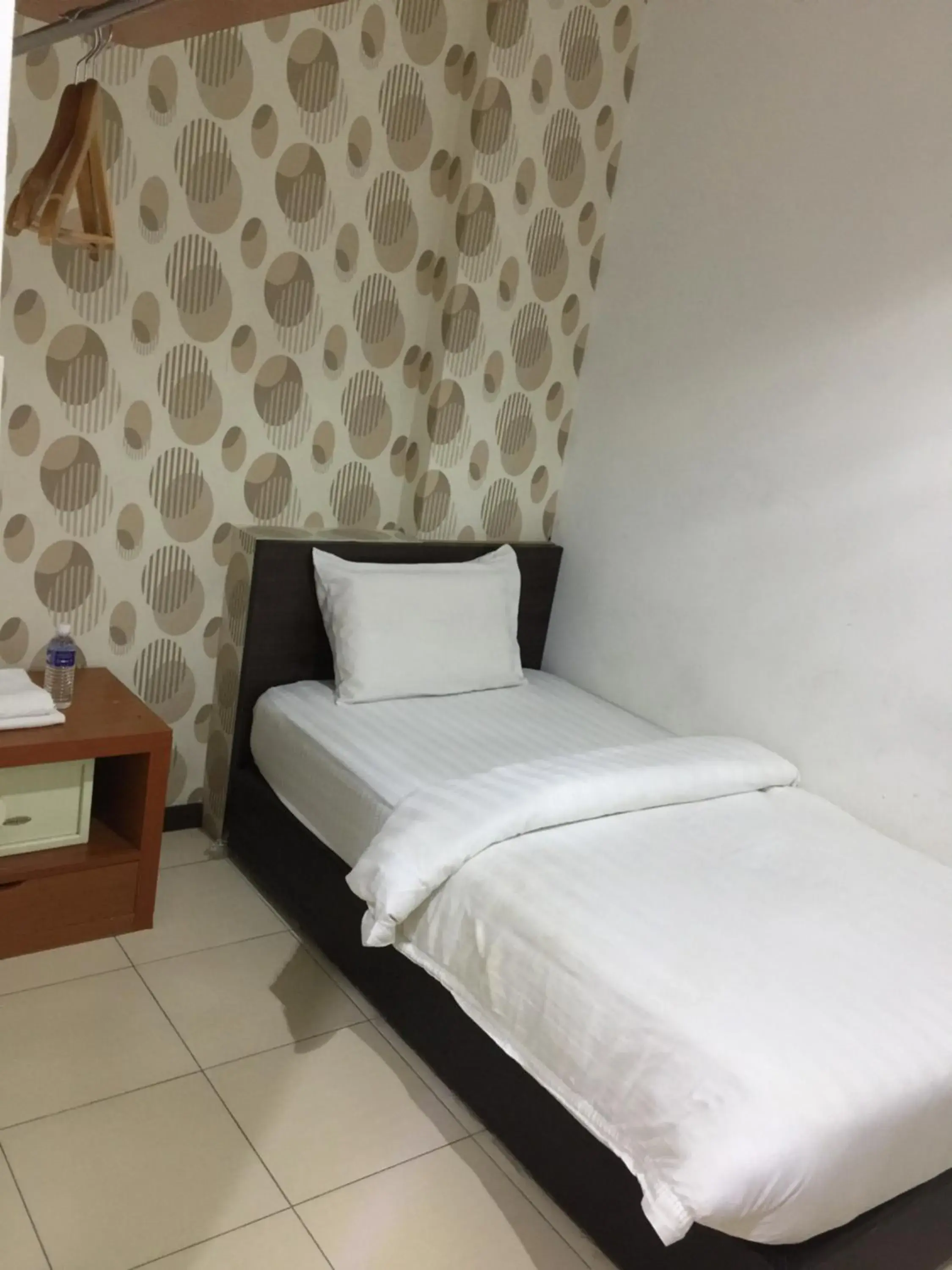 Bed in Permai Hotel