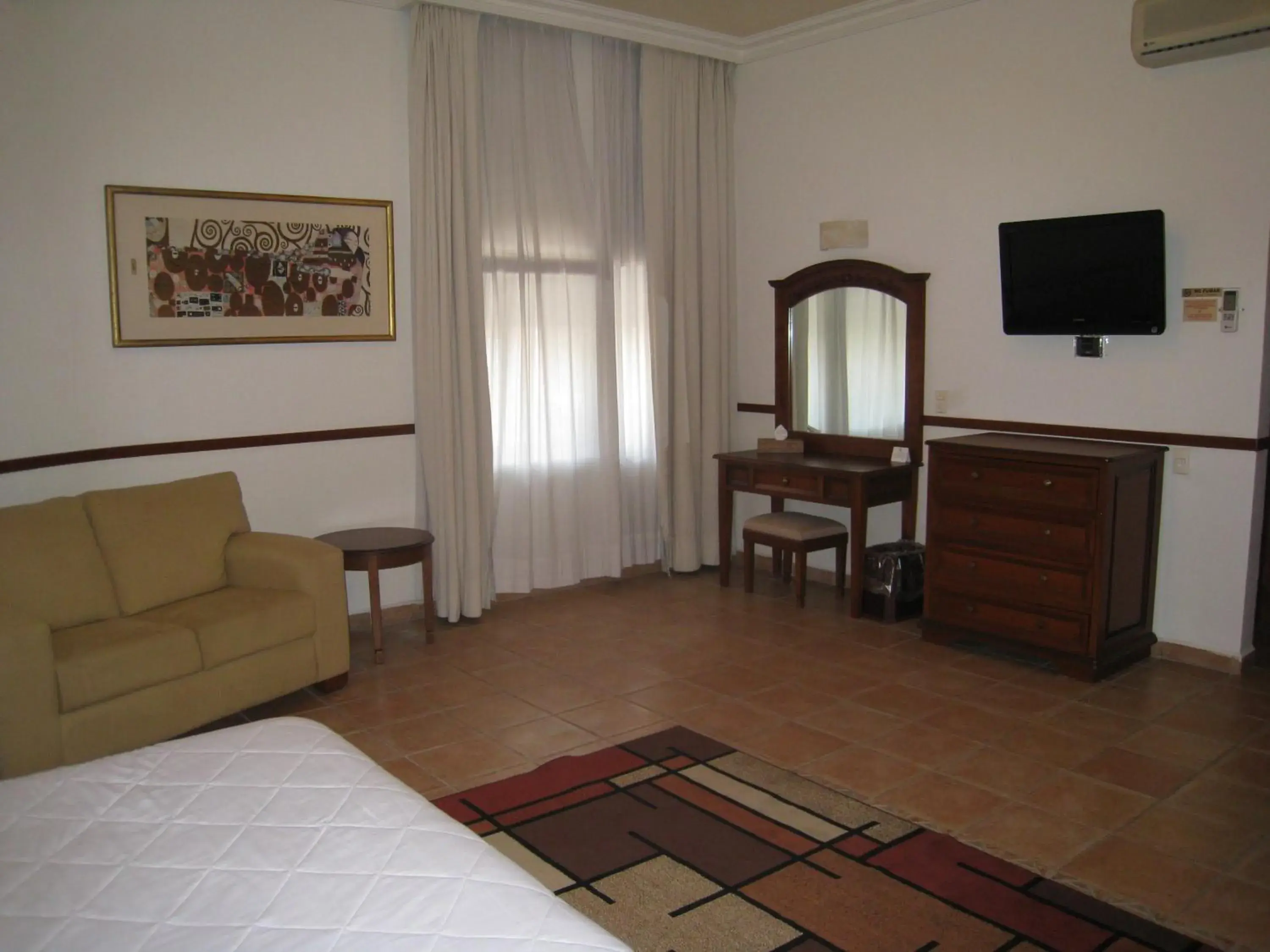 Bedroom, TV/Entertainment Center in Hotel Argento