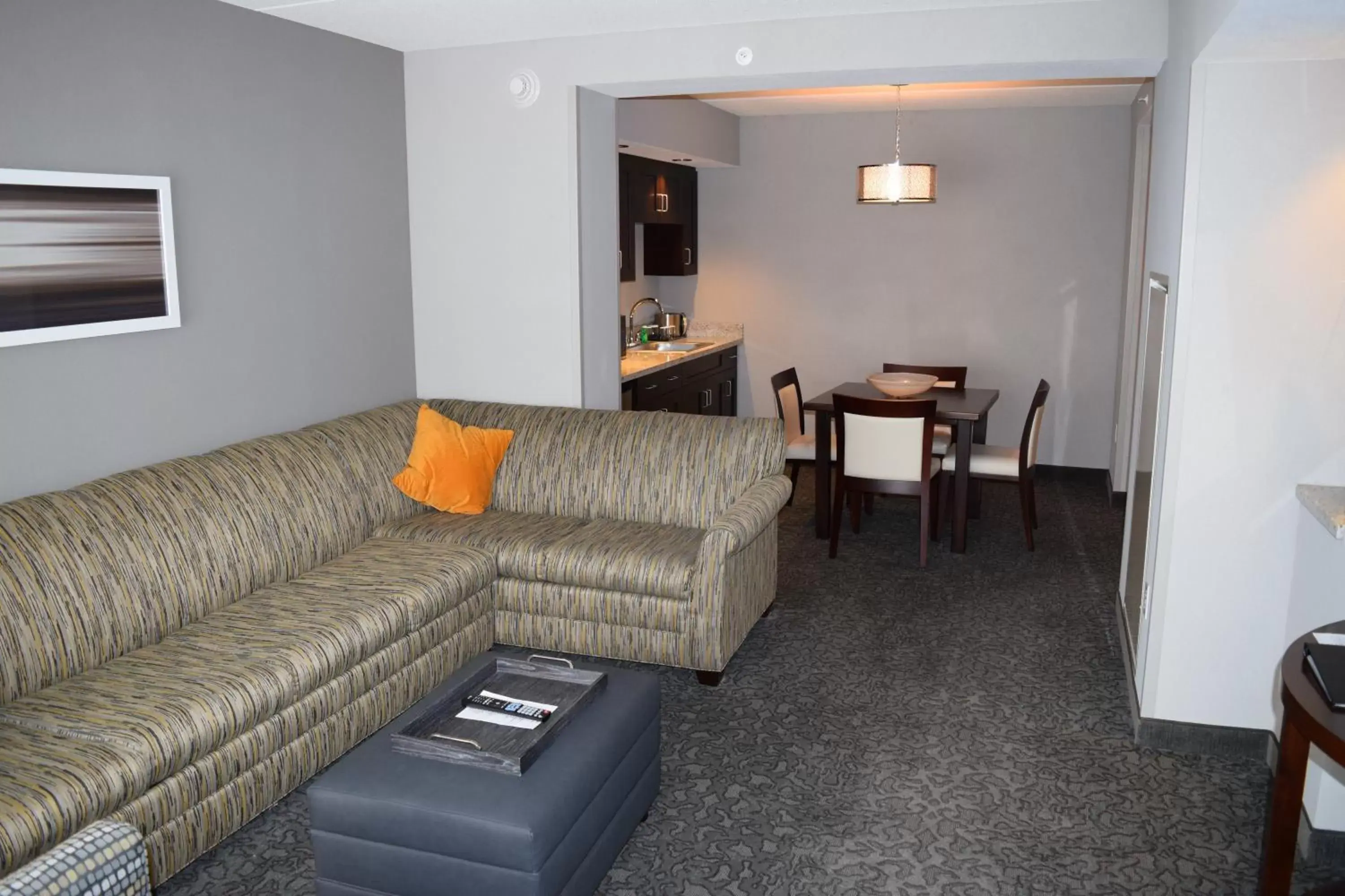 Bedroom, Seating Area in Holiday Inn and Suites East Peoria, an IHG Hotel