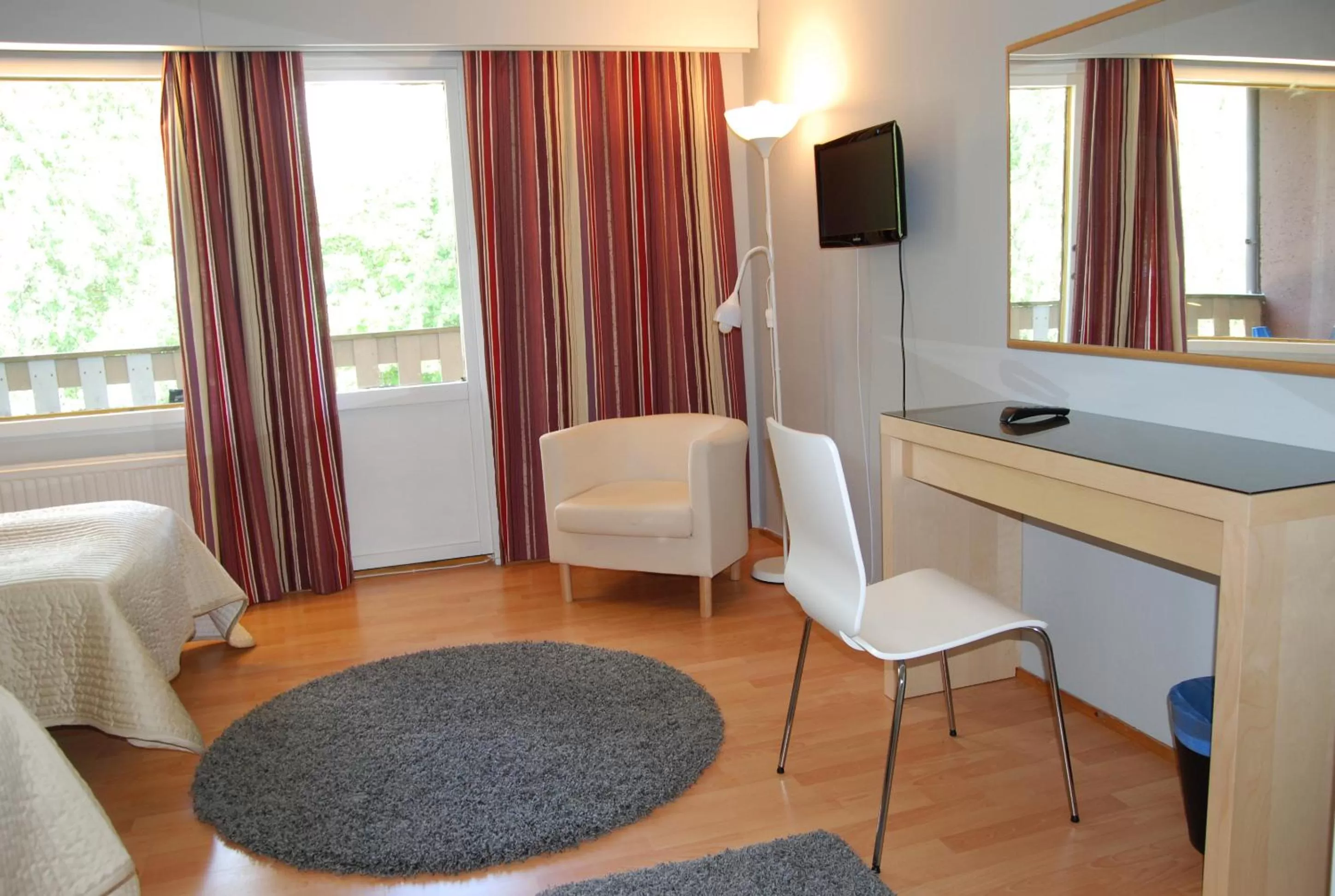 Bed in Revontuli Resort Rooms