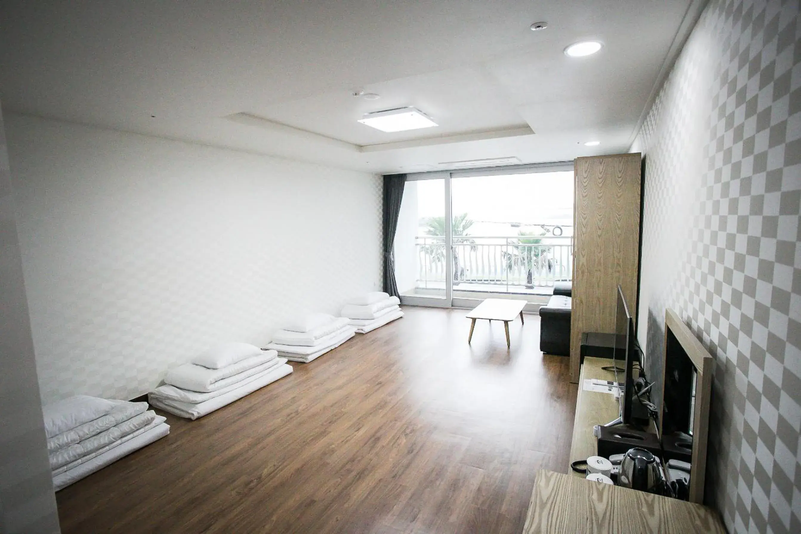 Bedroom, Seating Area in Breeze Bay Hotel