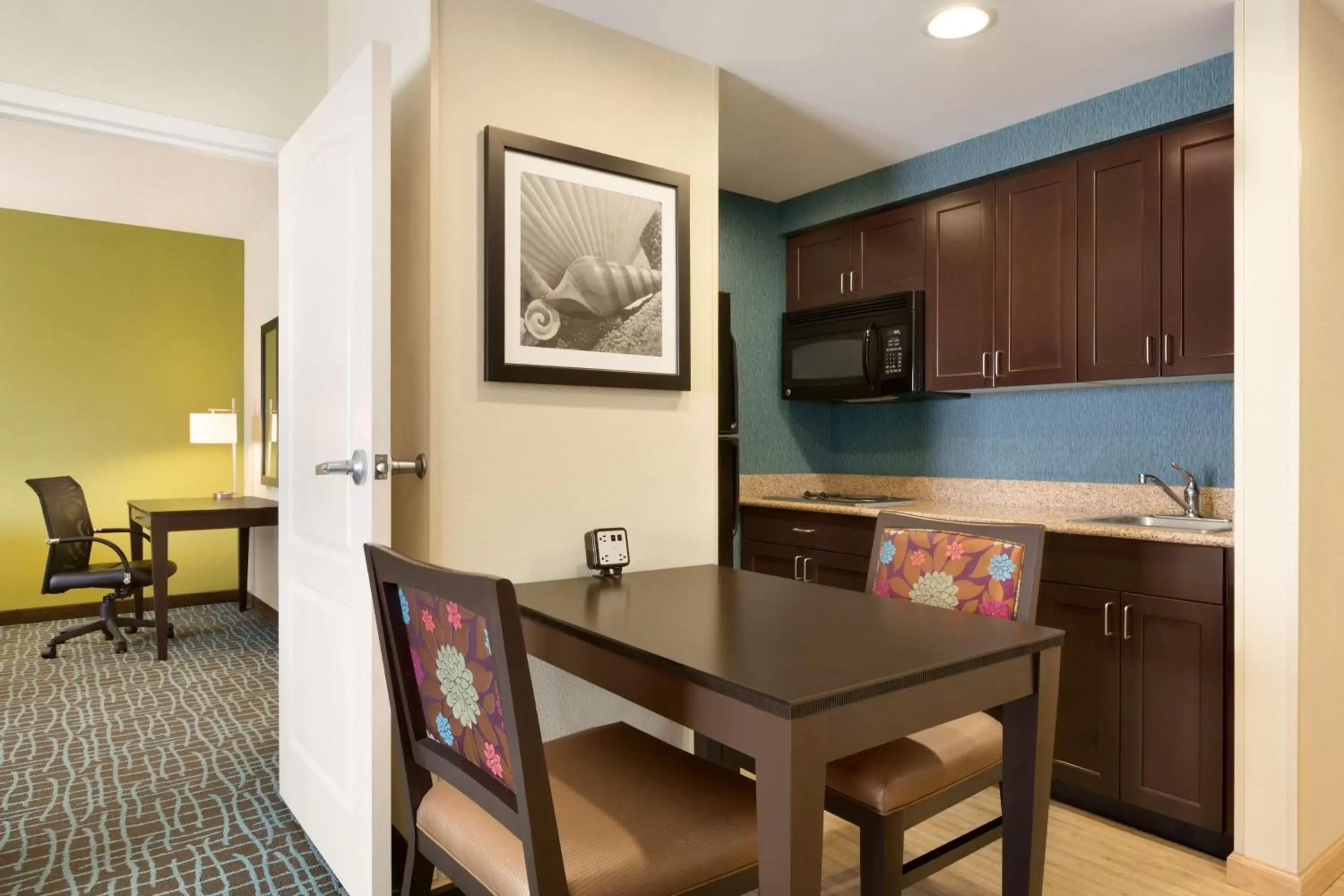 Bedroom, Kitchen/Kitchenette in Homewood Suites Fort Myers Airport - FGCU