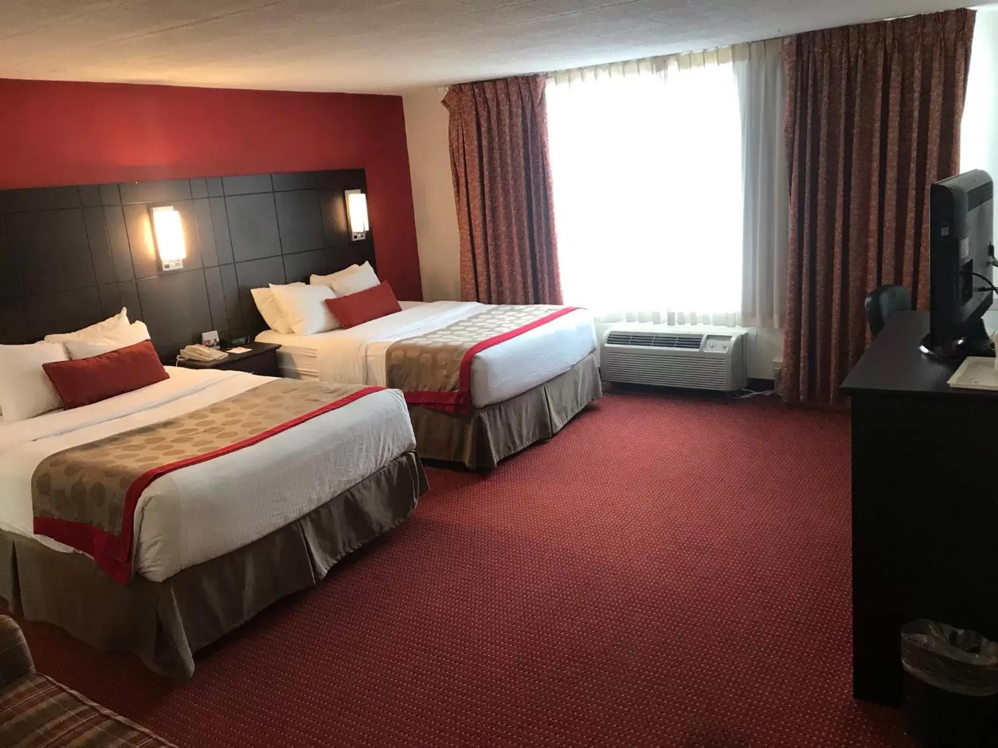 Bedroom, Bed in Ramada by Wyndham Ligonier