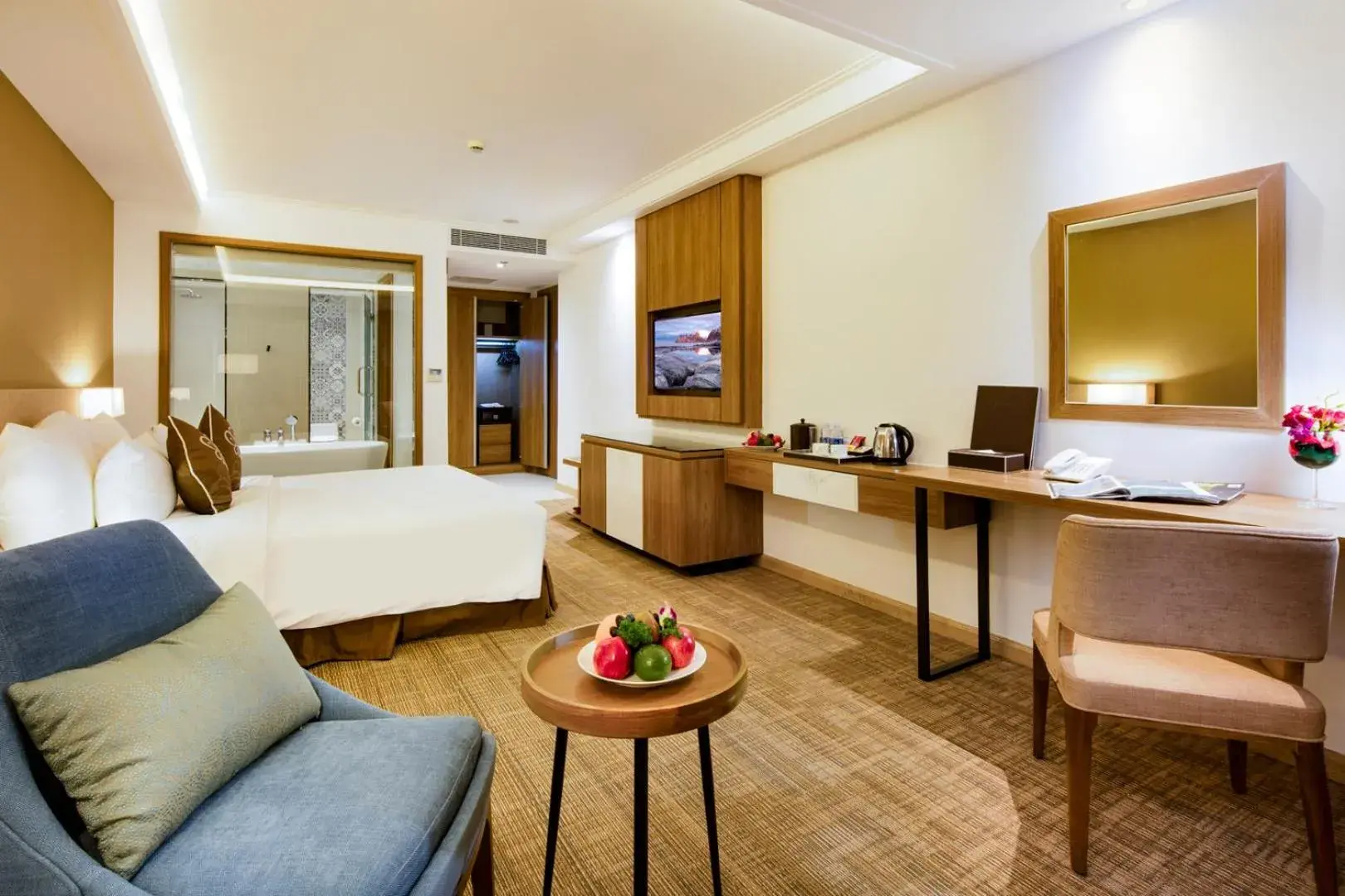 Bed, TV/Entertainment Center in Asteria Comodo Nha Trang Hotel