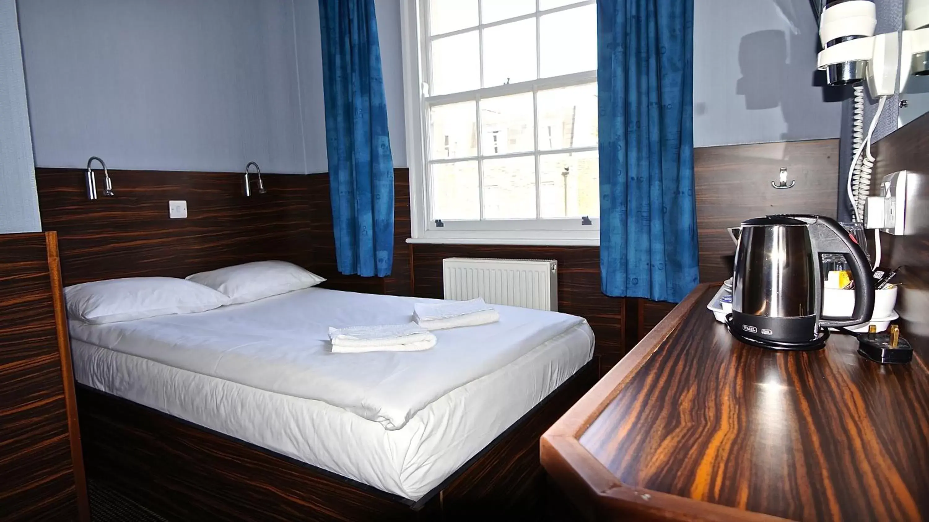 Bedroom in Crestfield Hotel