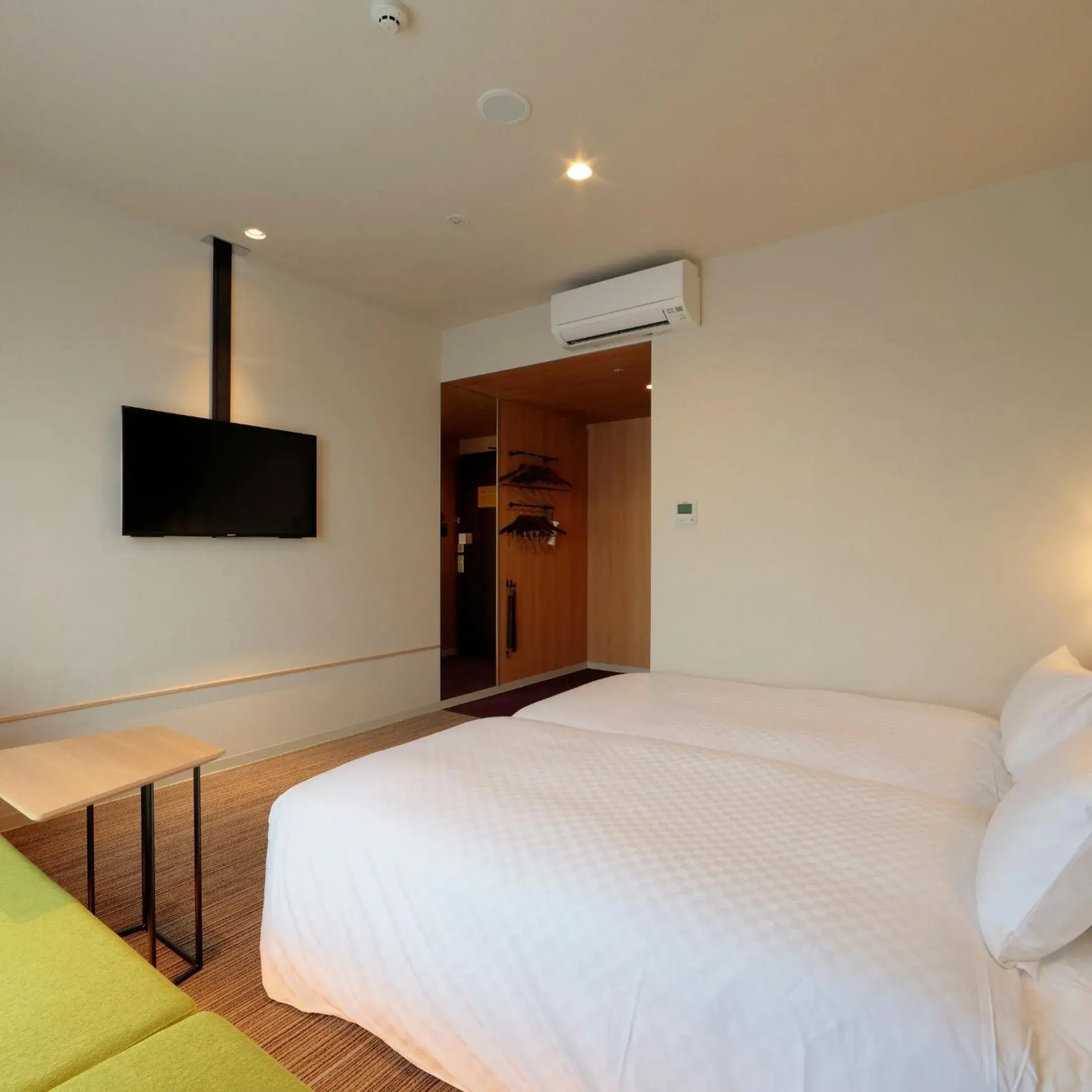 Bed in Candeo Hotels Osaka Kishibe Bed in Candeo Hotels Osaka Kishibe