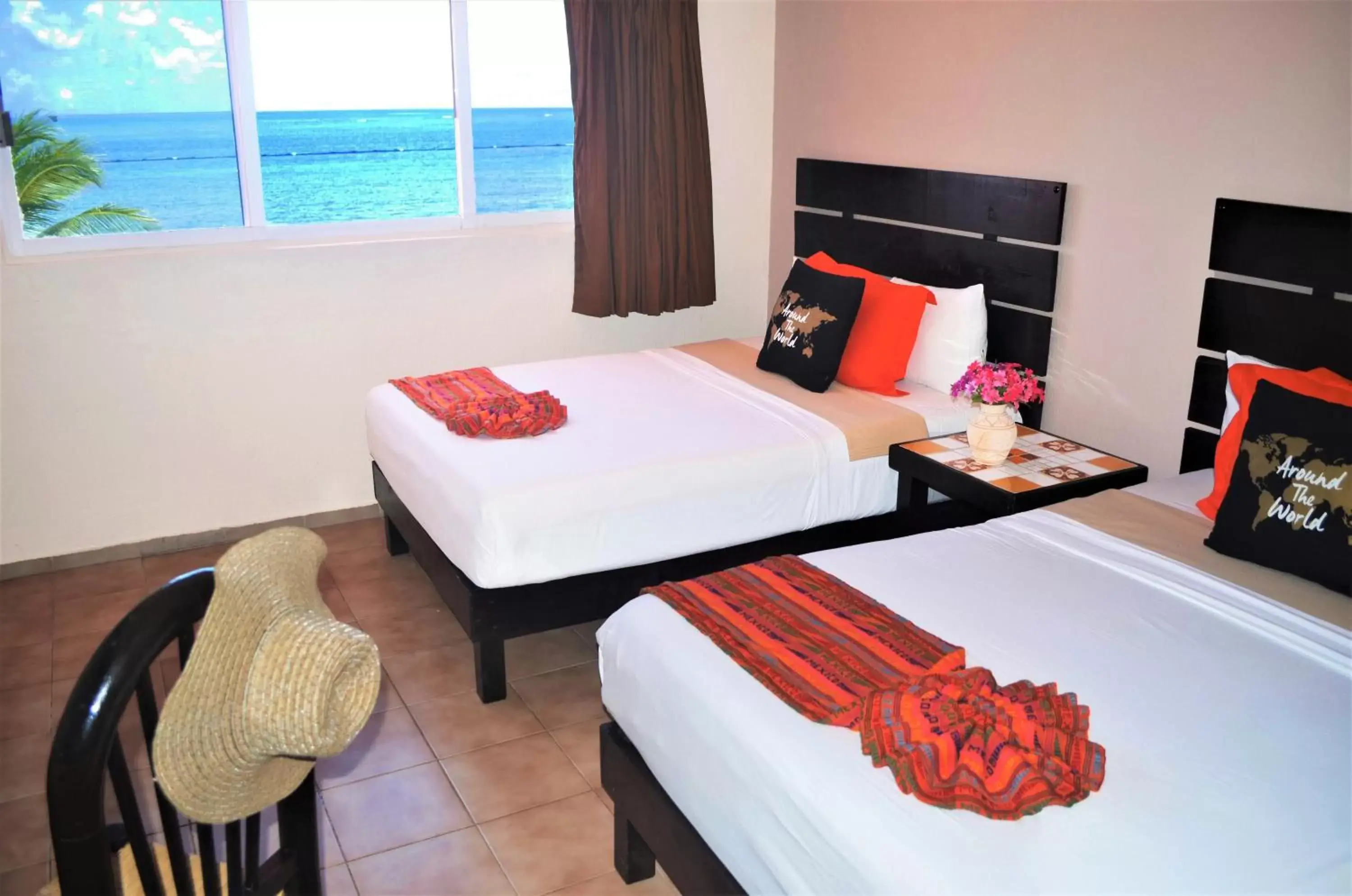 Photo of the whole room, Bed in Hacienda Morelos Beachfront Hotel Photo of the whole room, Bed in Hacienda Morelos Beachfront Hotel