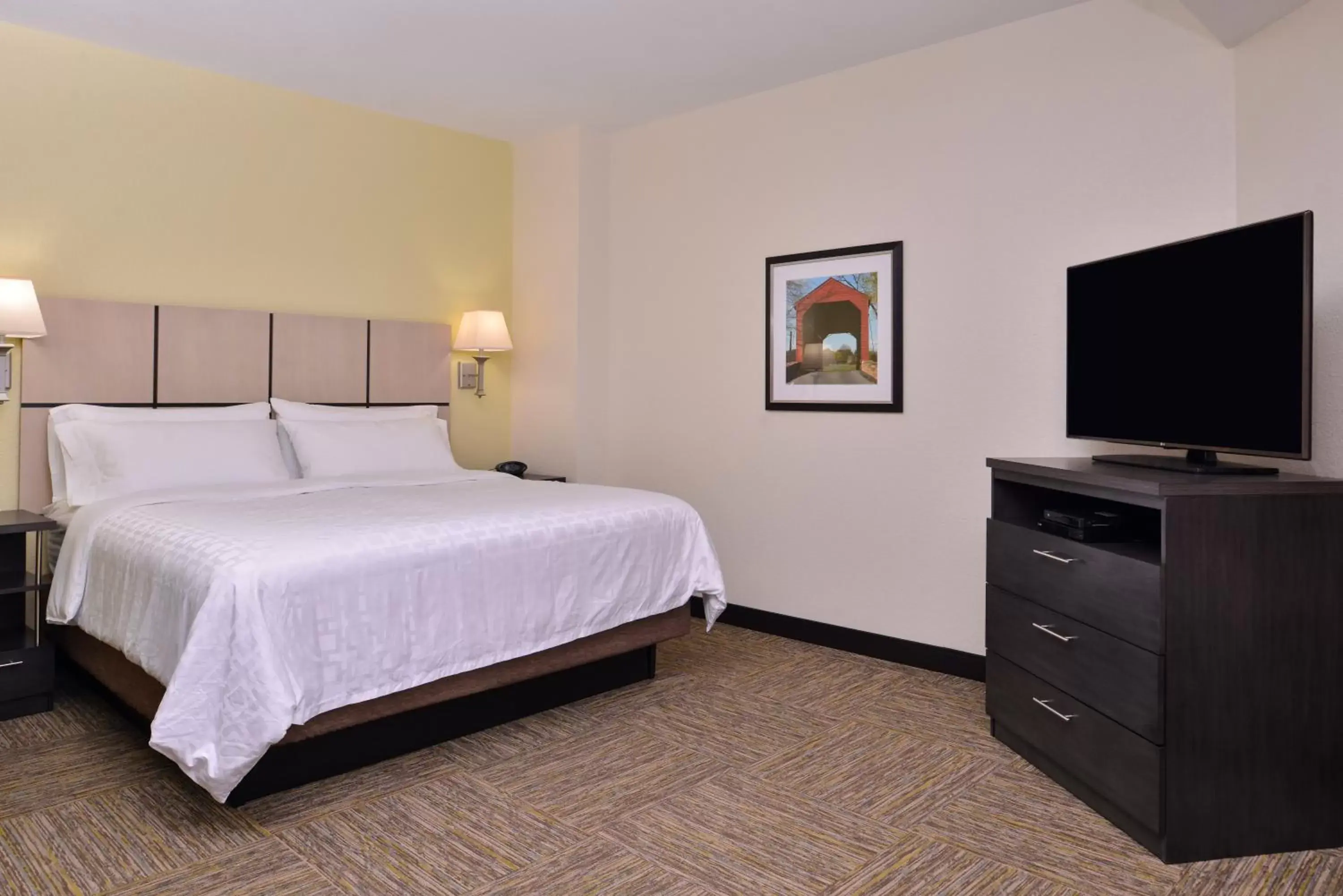 Photo of the whole room, Bed in Candlewood Suites Terre Haute, an IHG Hotel