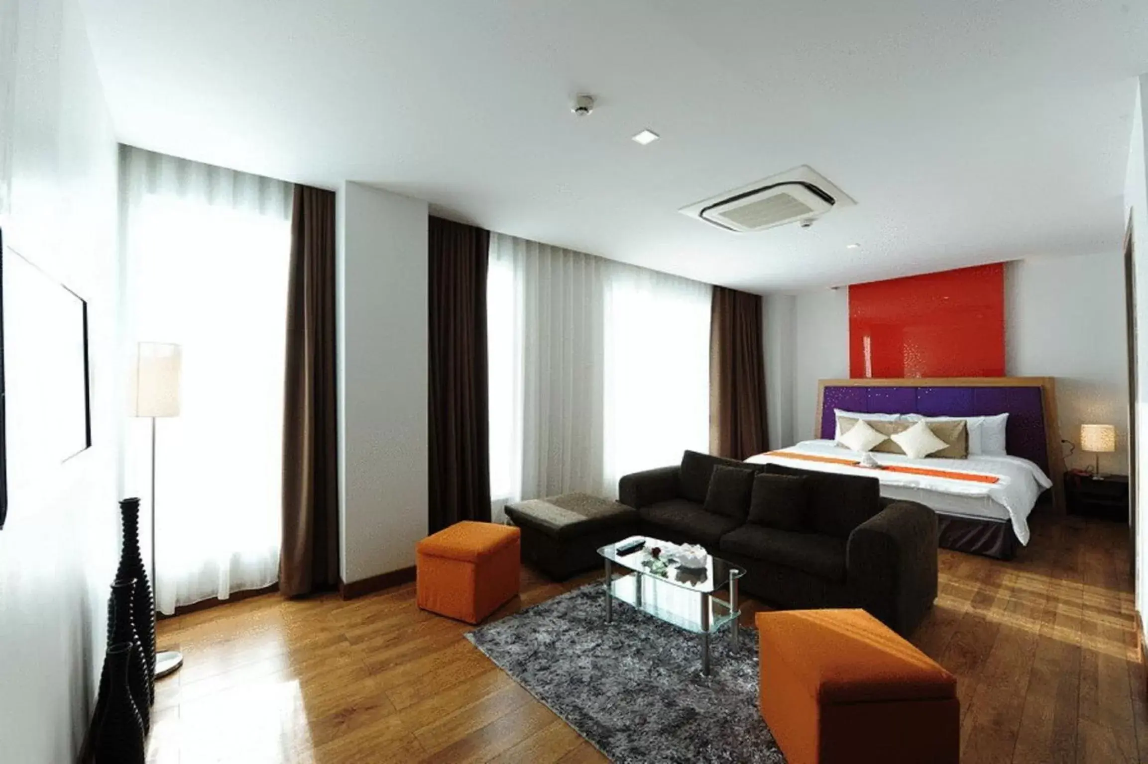 Bed, Seating Area in Prajaktra Design Hotel