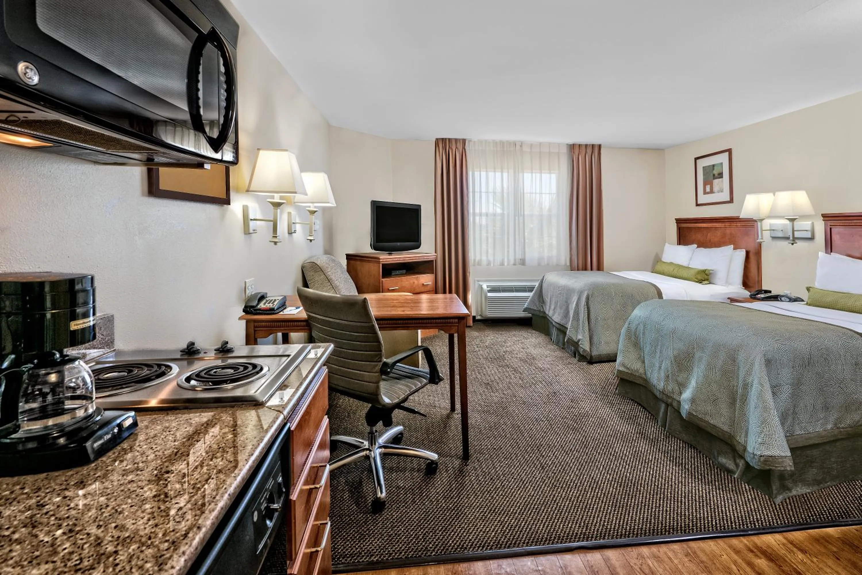 Photo of the whole room, Bed in Candlewood Suites Galveston by IHG