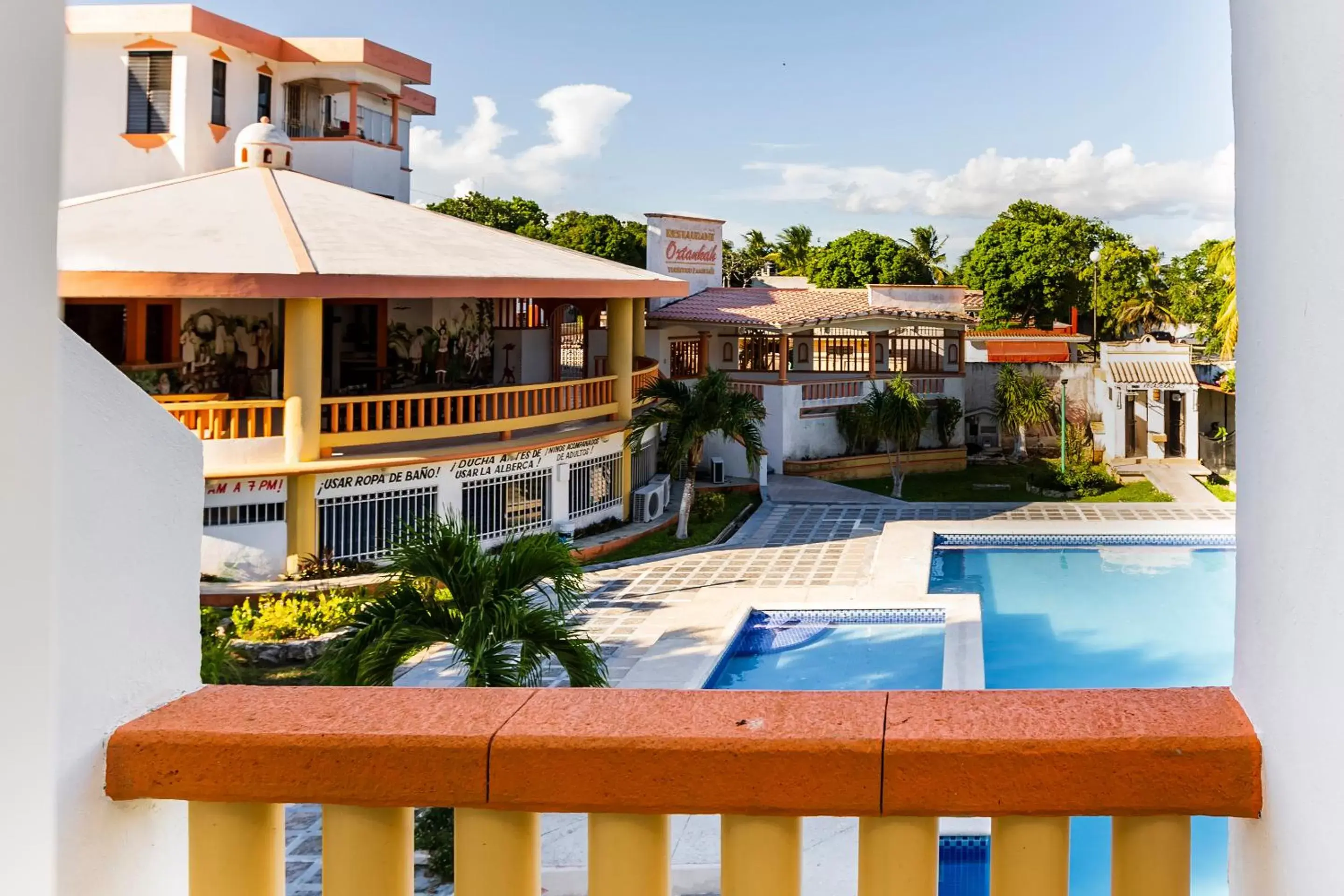 Balcony/Terrace, Pool View in Capital O Oxtankah,chetumal bay