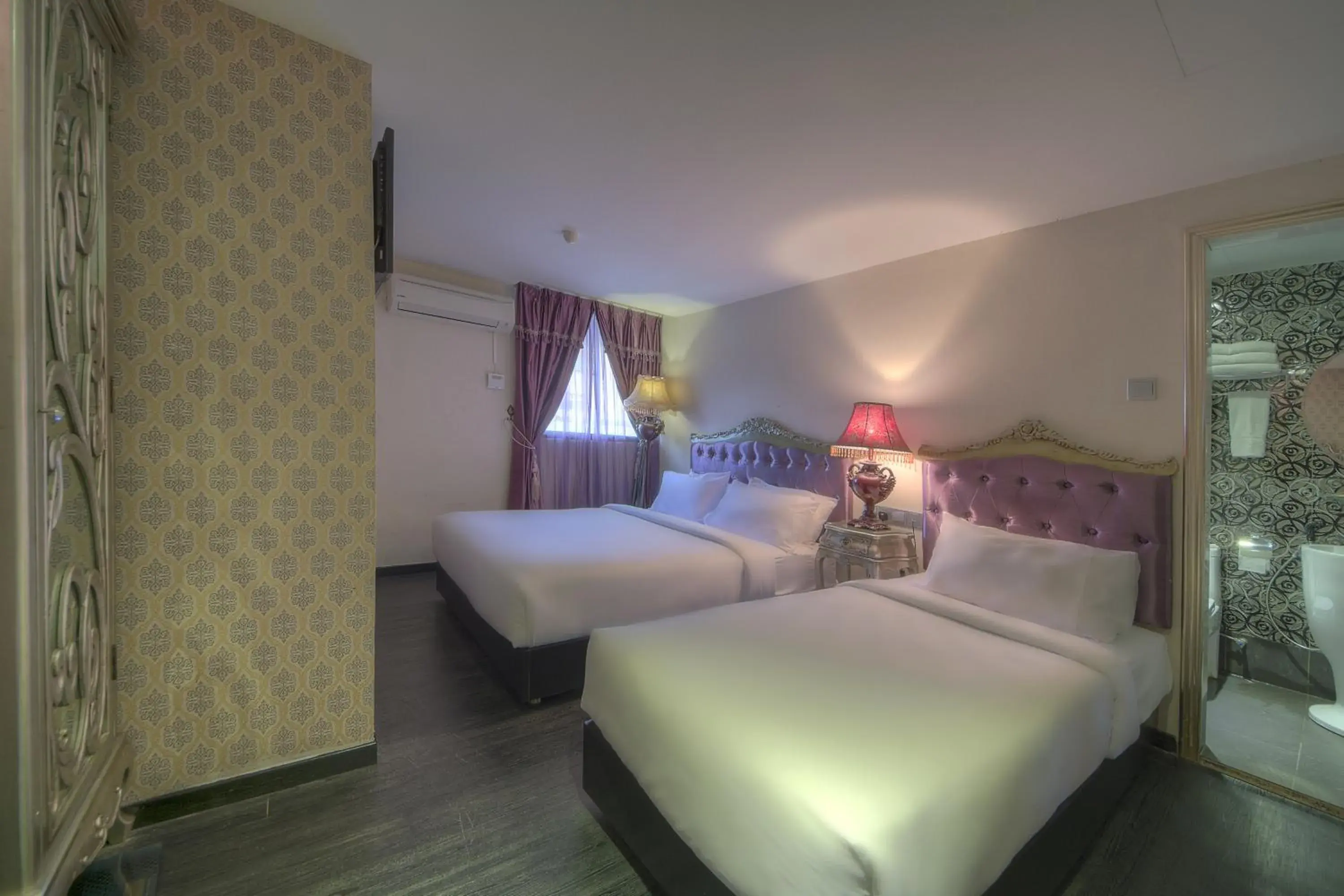 Bedroom in Arenaa Batik Boutique Hotel