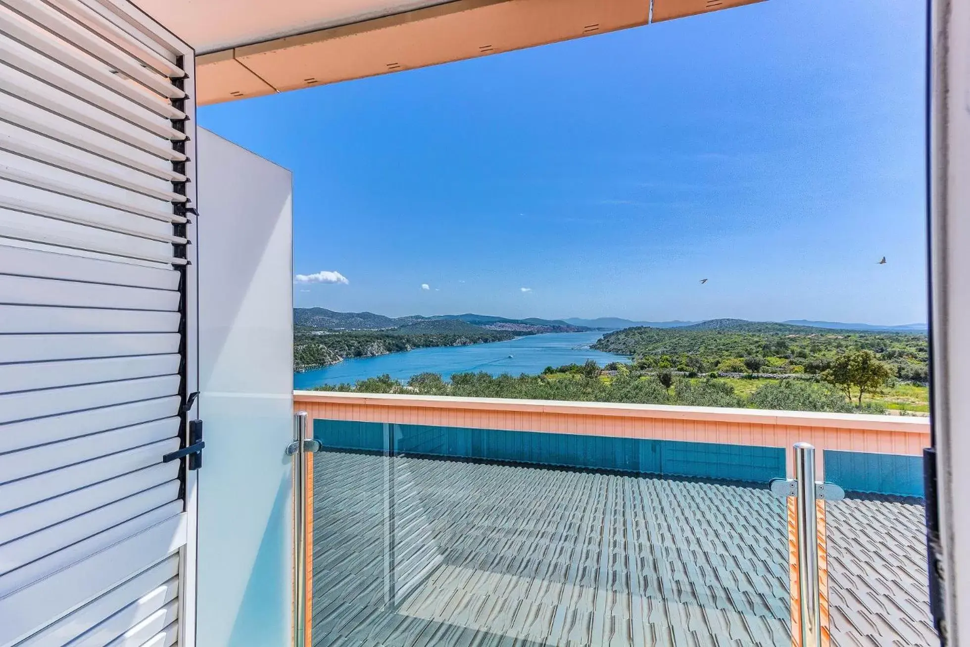 Bed, Pool View in Hotel Panorama