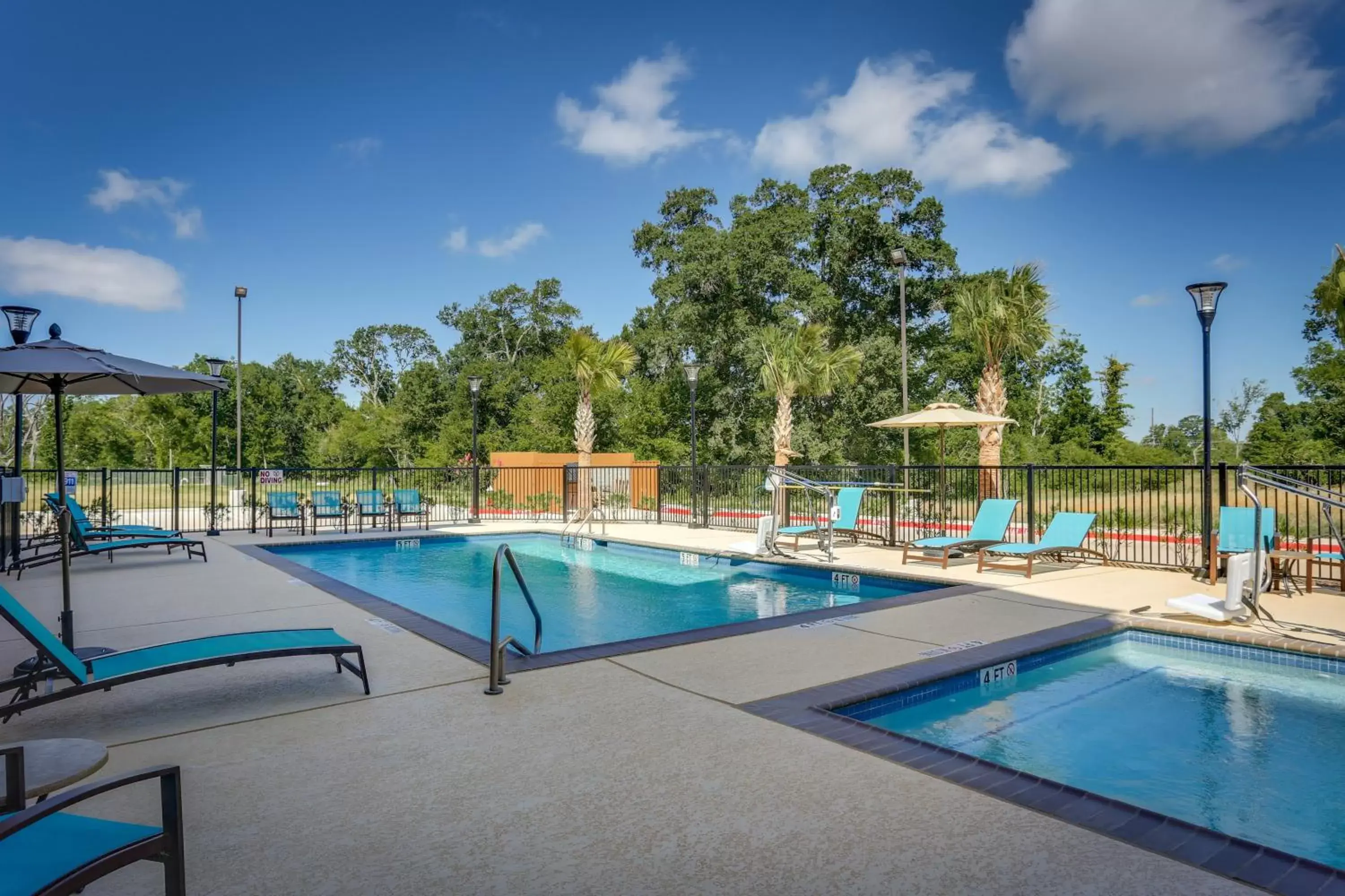 Swimming Pool in Candlewood Suites College Station, an IHG Hotel