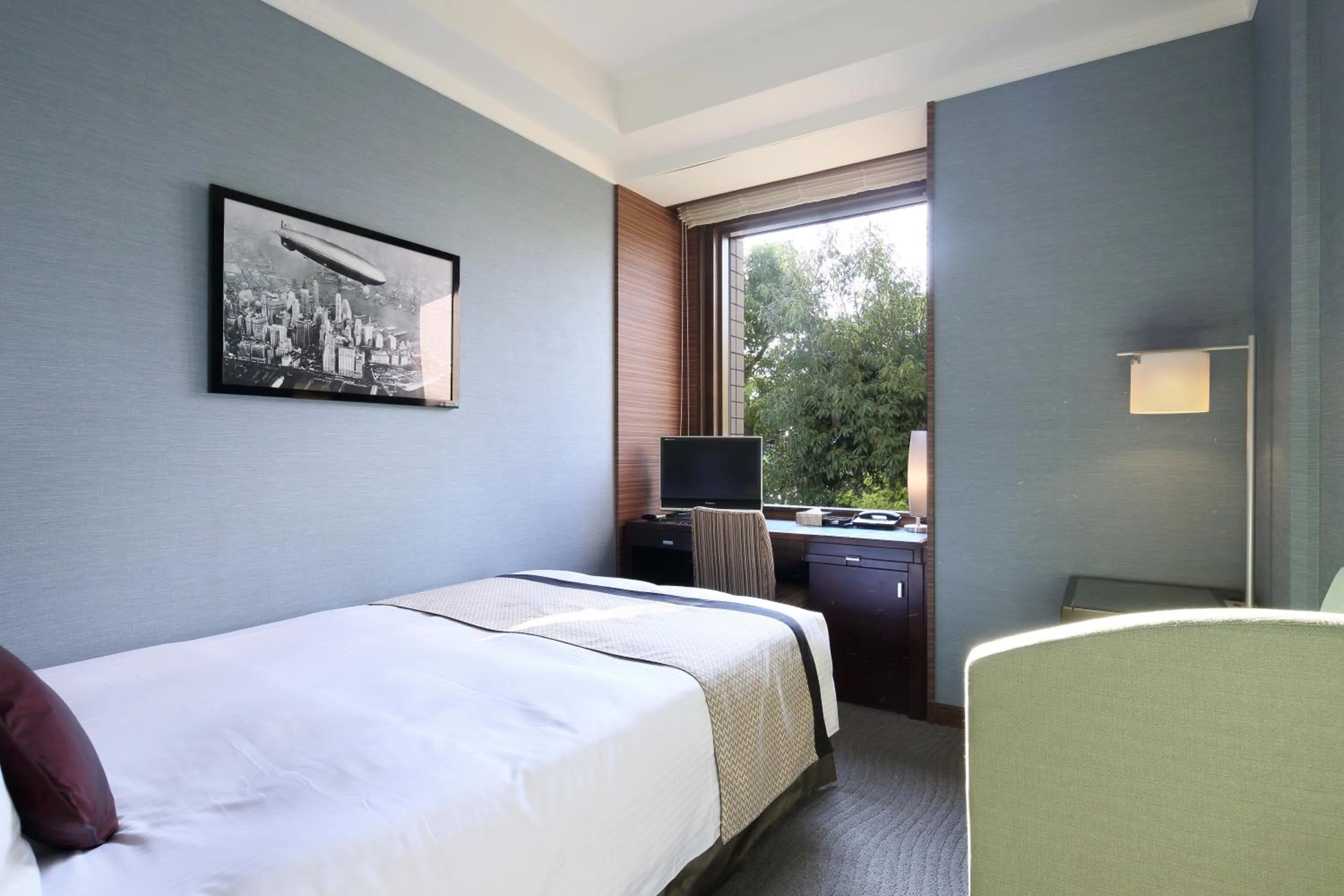 Bed in Hotel Trusty Tokyo Bayside