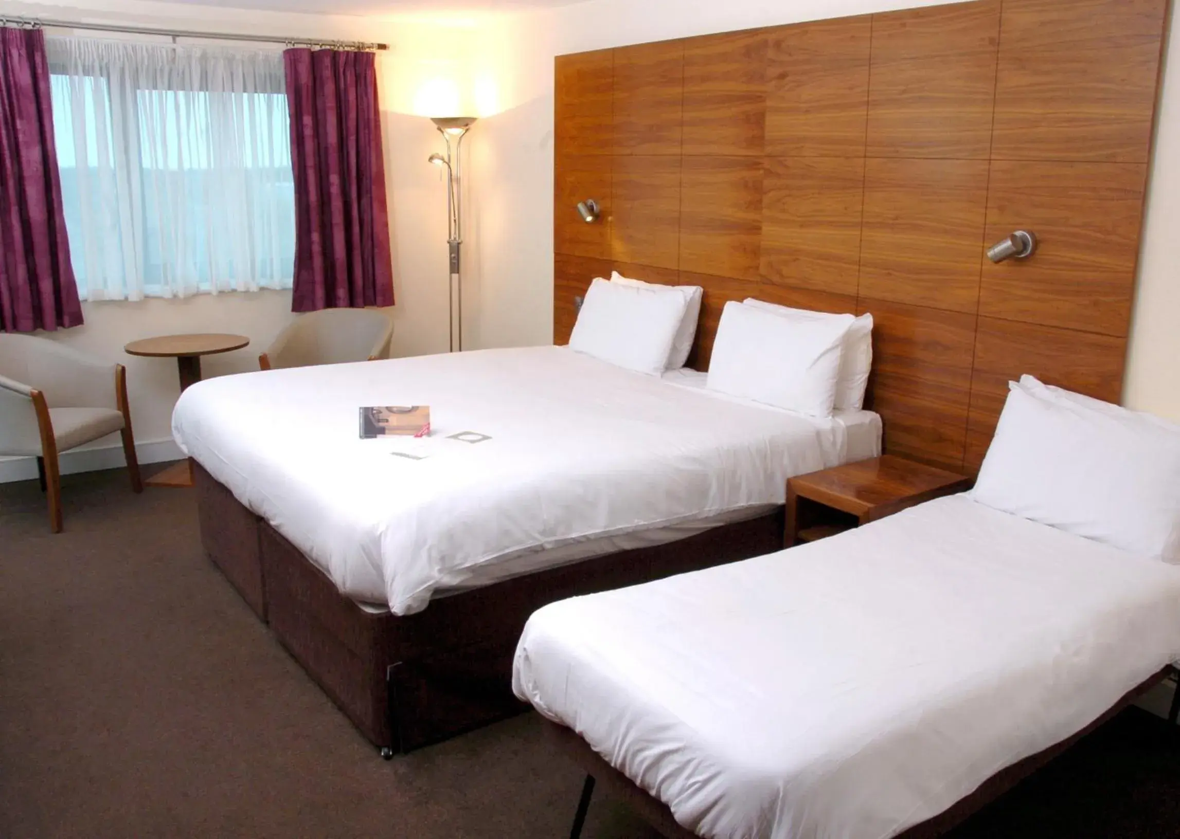 Bed in Legacy Preston International Hotel