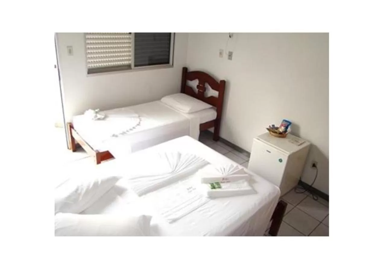 Bed in Hotel Brasil Real