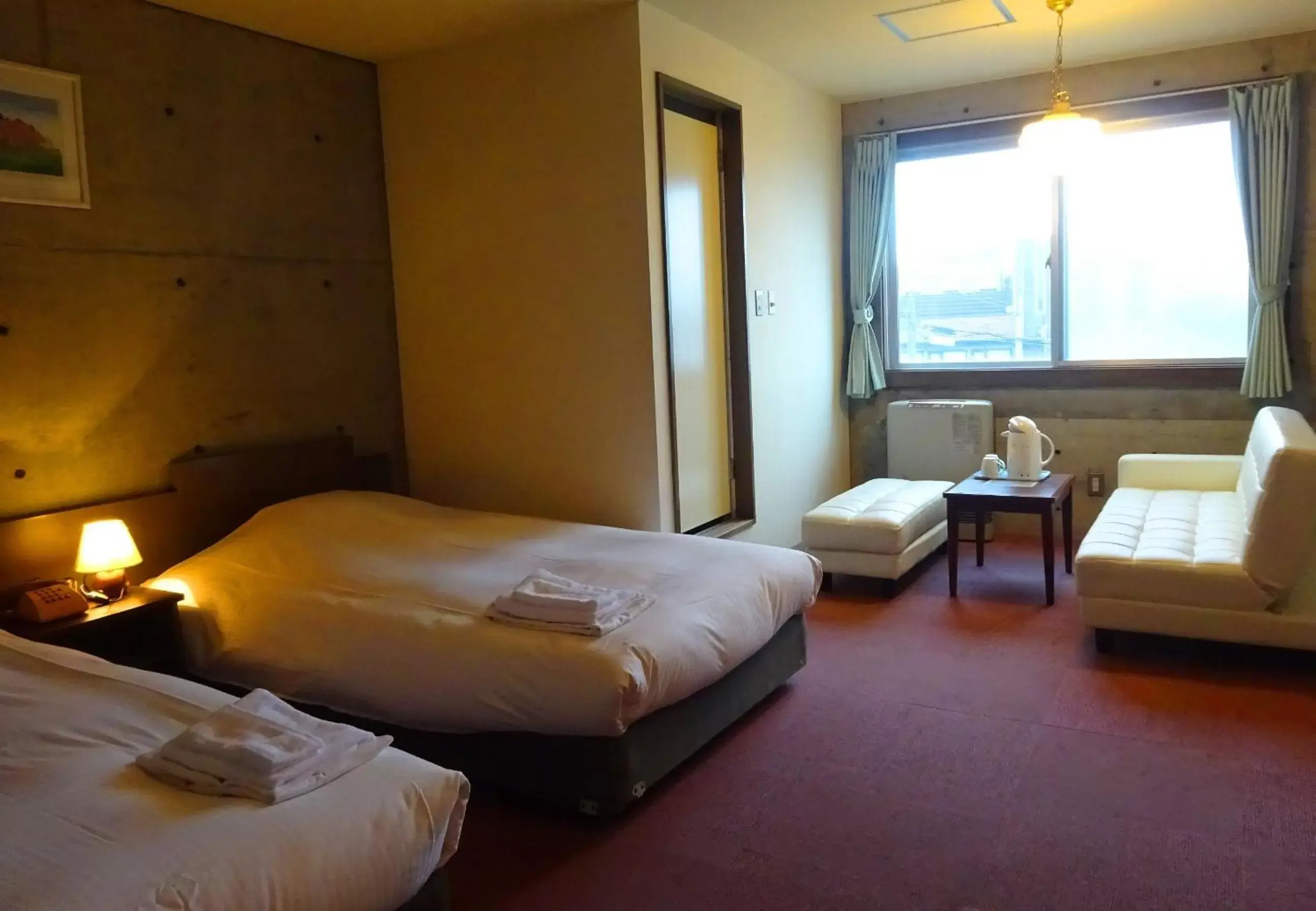 Bed in Hakodate Motomachi Hotel