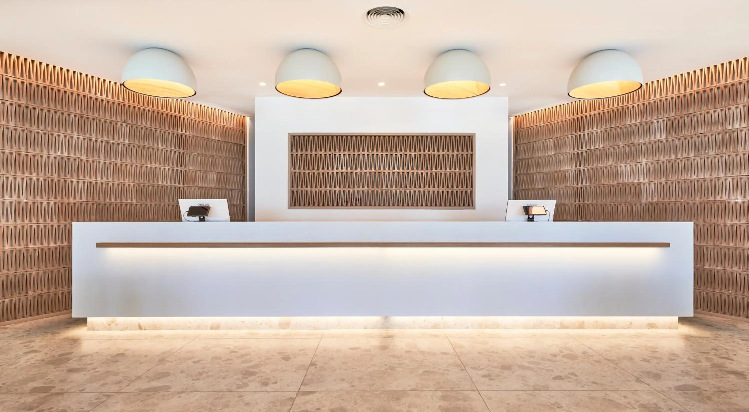 Lobby or reception in Hotel & Spa S'Entrador Playa