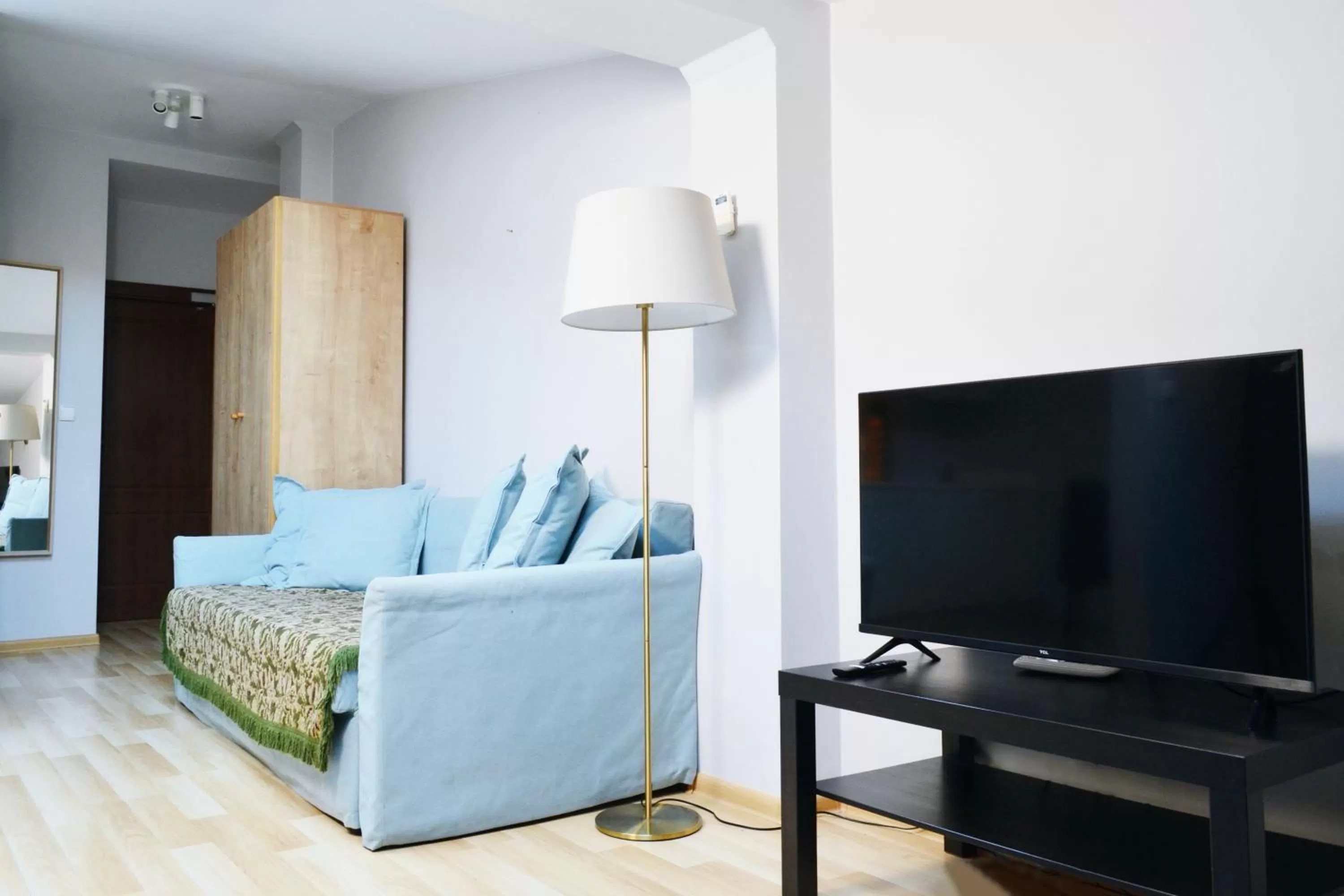 TV/Entertainment Center in 21 Floriańska Street Apartments