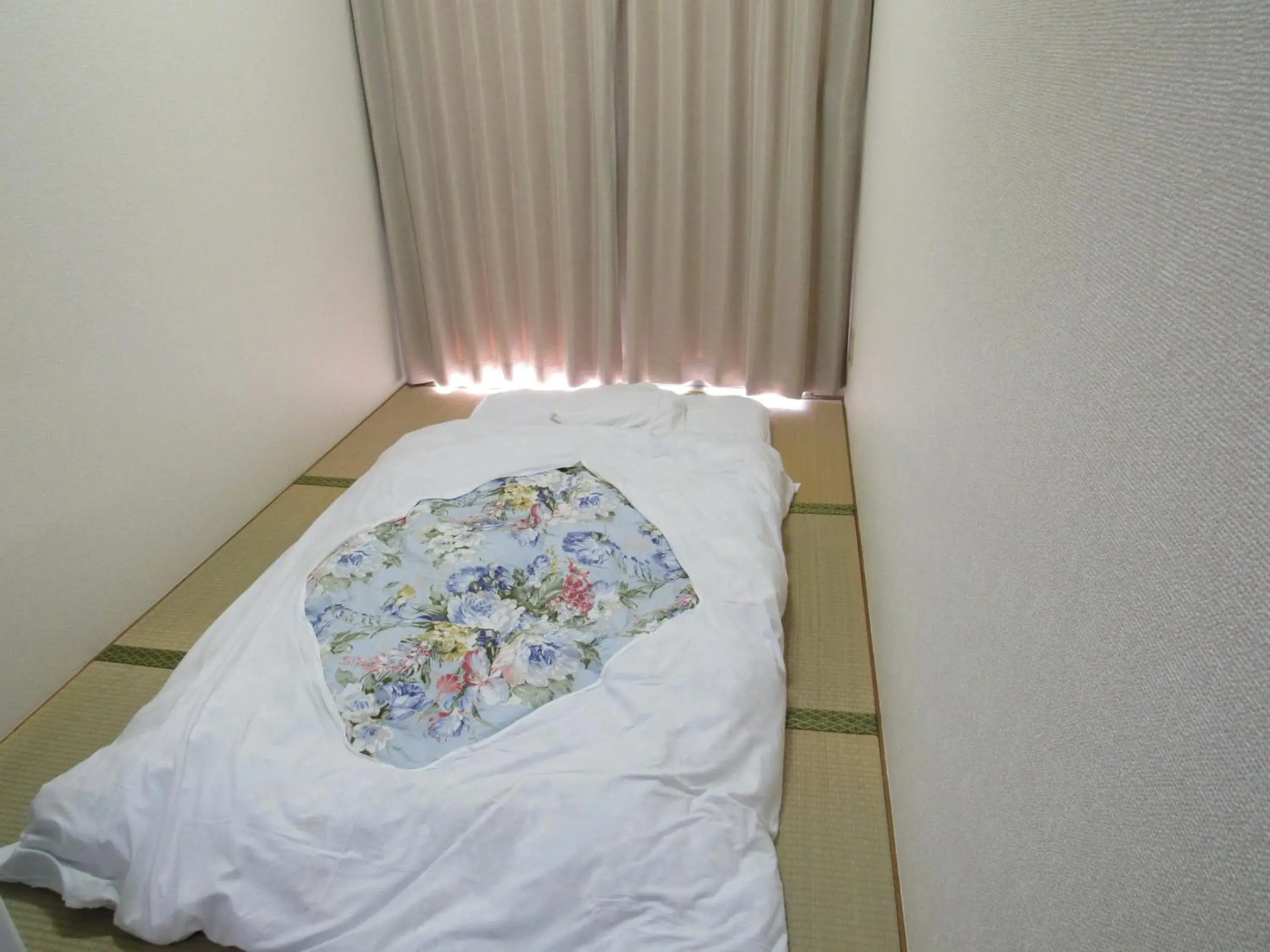 Bed in Hotel Mirai