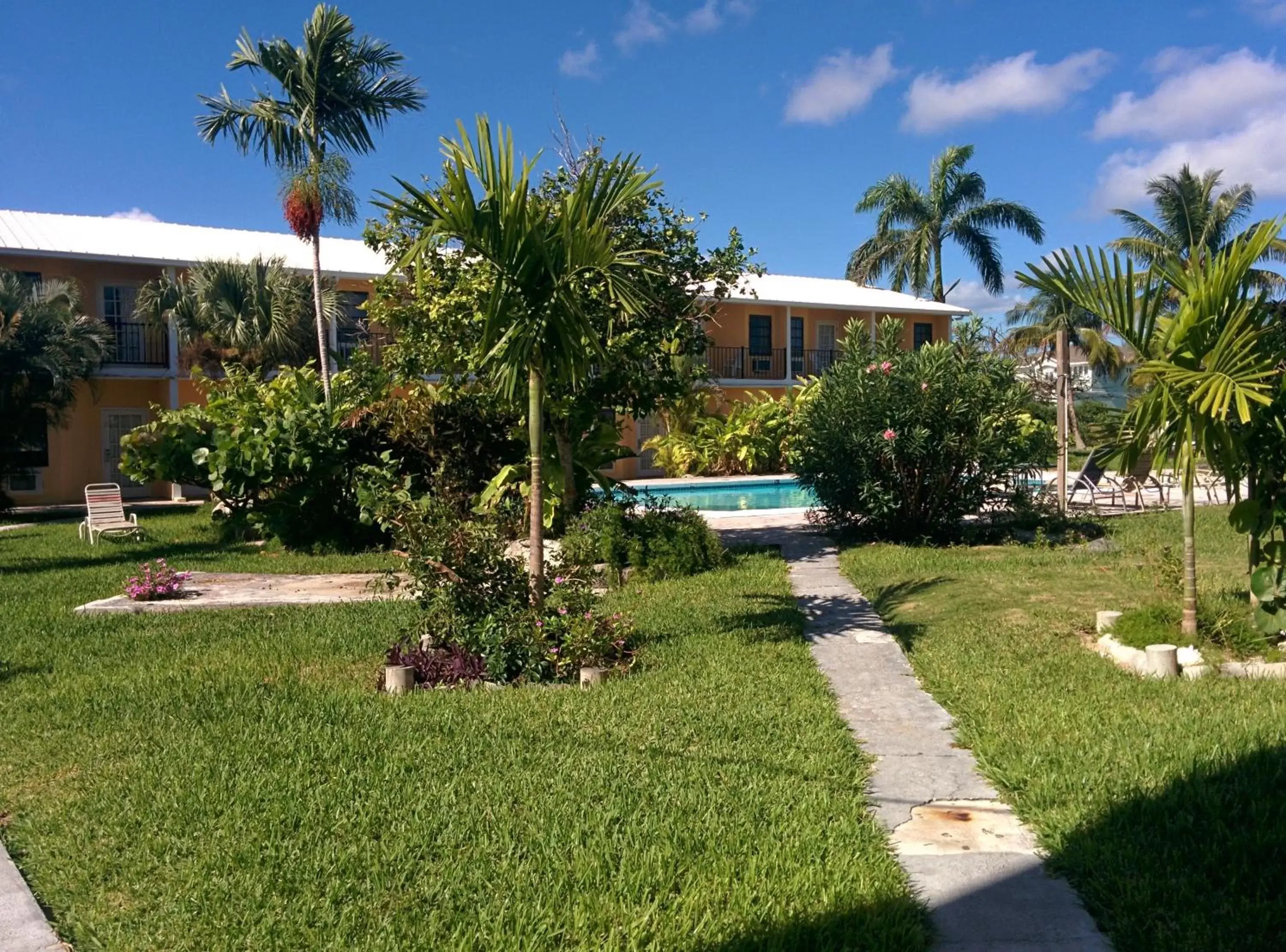 Garden, Swimming Pool in Orange Hill Beach Inn