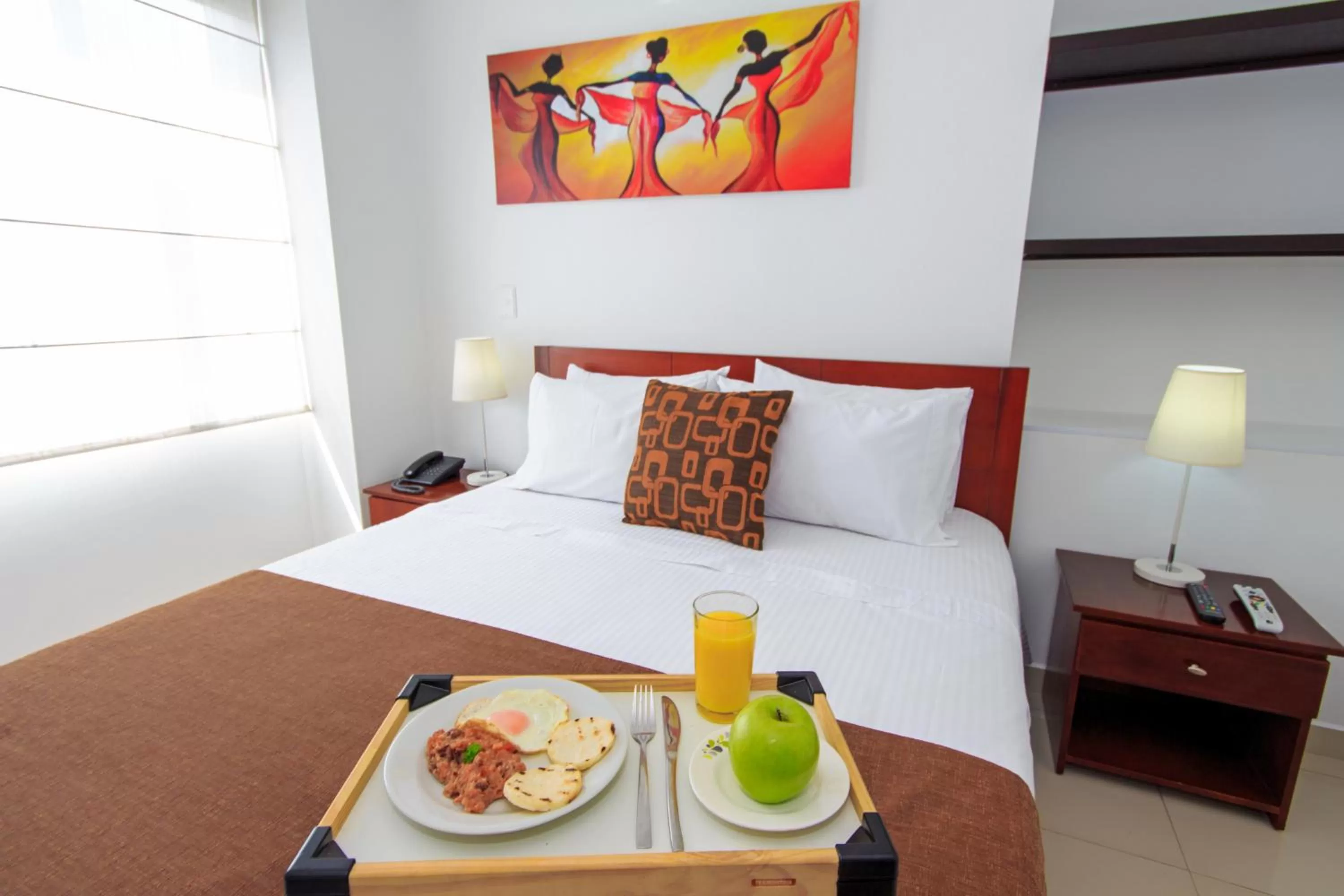 Bed in 122 Plaza Apartahotel