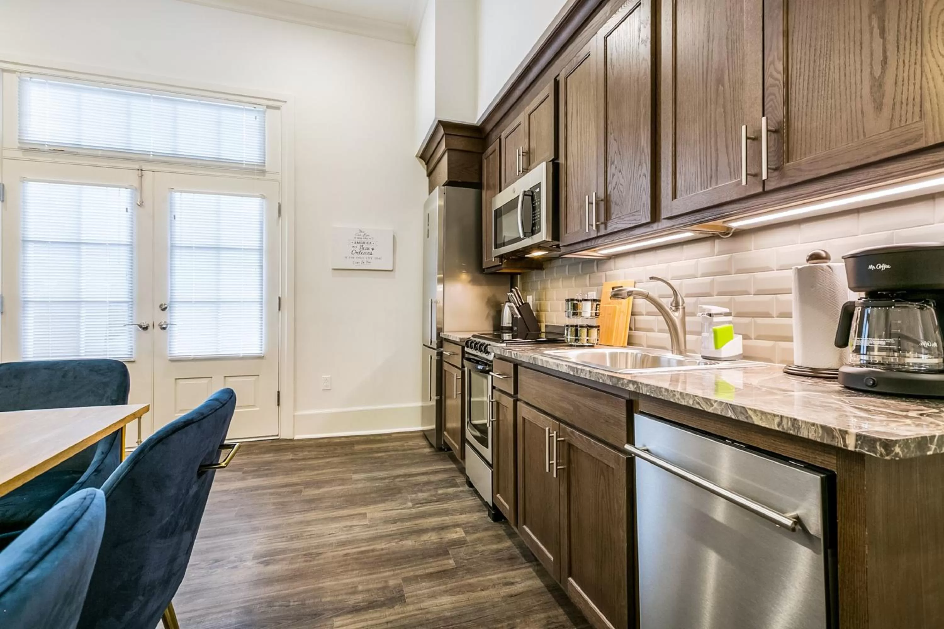 Kitchen or kitchenette in 1 and 2 BR Private Condos Steps Away From French Quarter