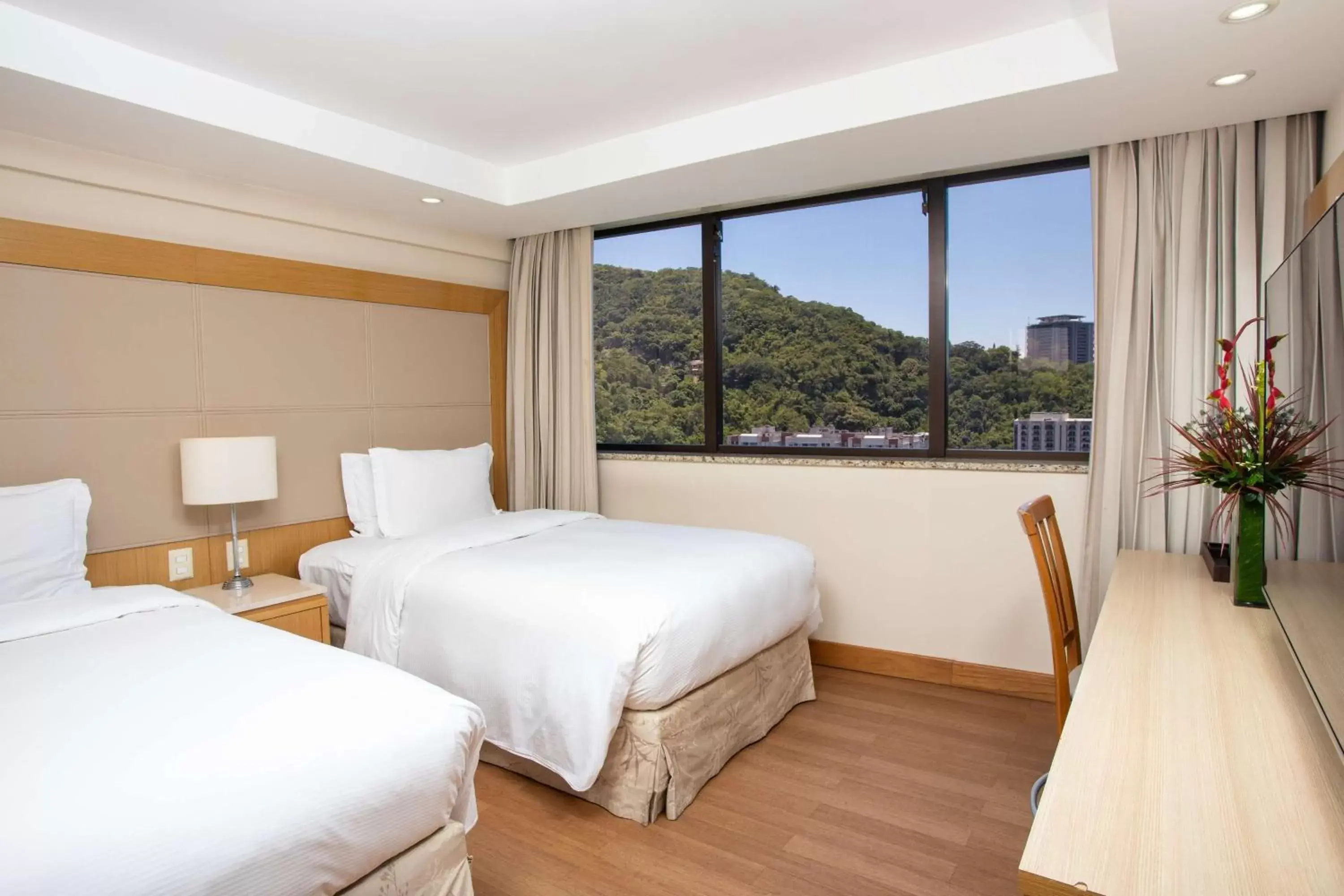 Photo of the whole room, Bed in Hilton Copacabana Rio de Janeiro