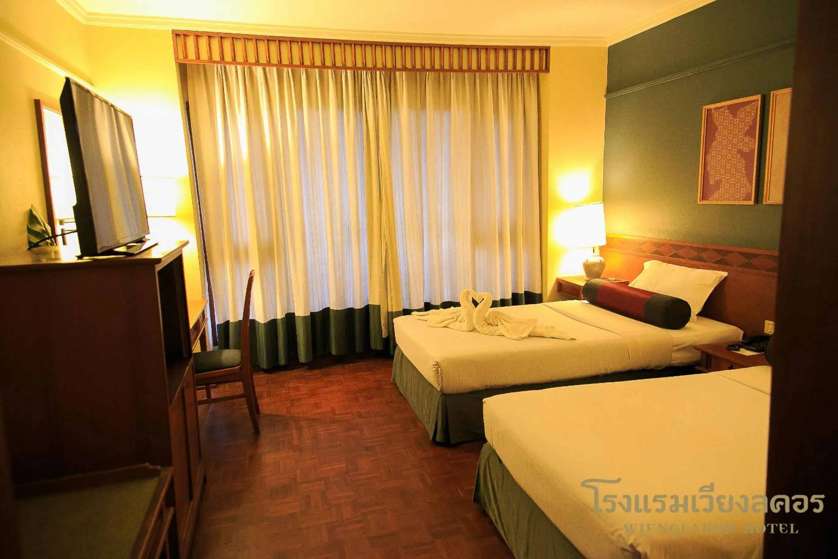 Photo of the whole room, Bed in Wienglakor Hotel (SHA Extra Plus)