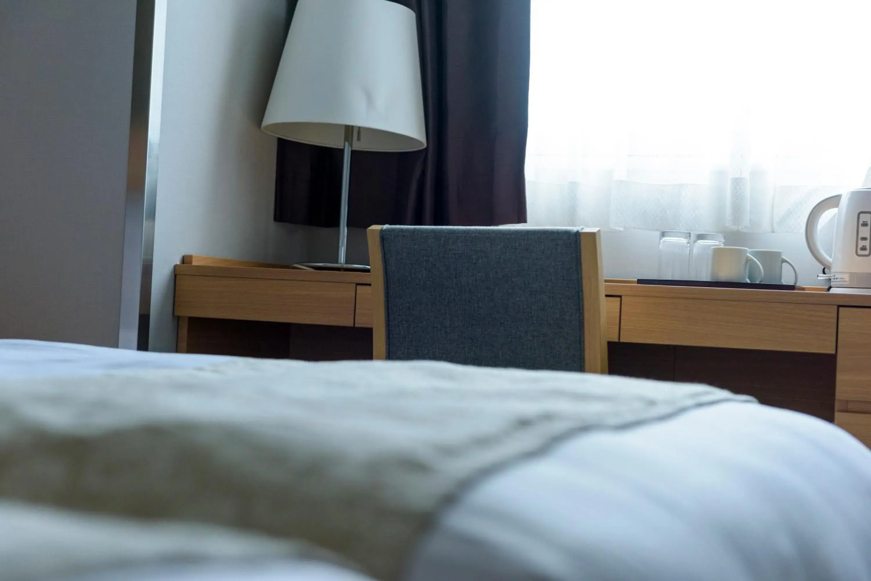 Bed in SureStay Plus Hotel by Best Western Shin-Osaka