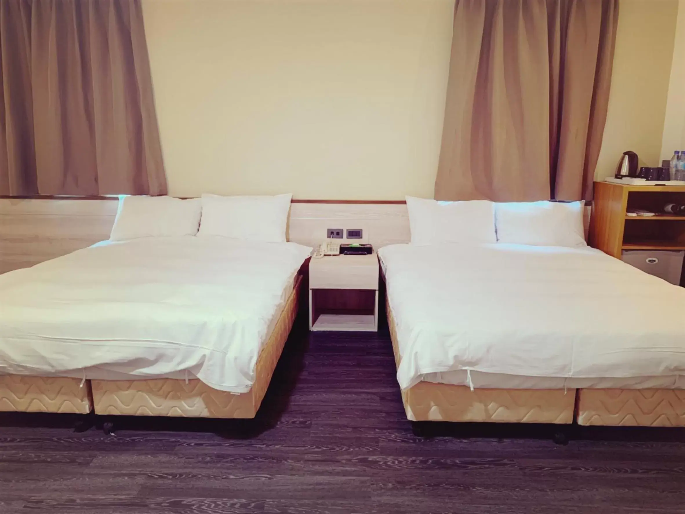 Bed in Raise Hotel Taichung