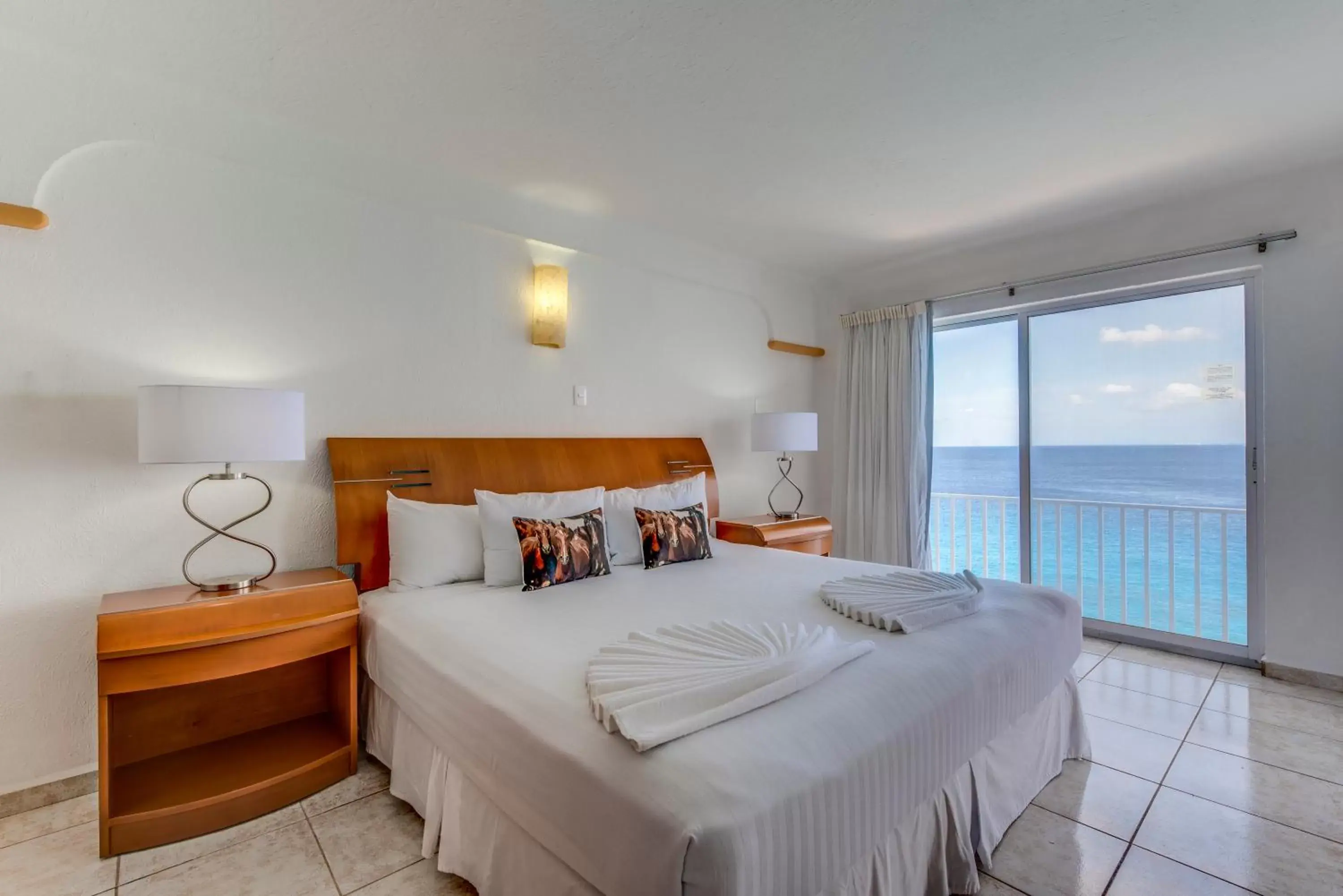 Bed in Coral Princess Hotel & Dive Resort
