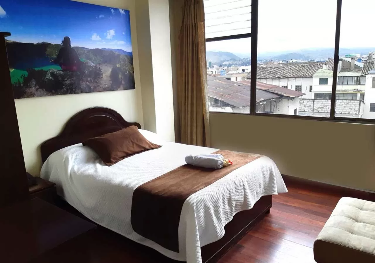 Photo of the whole room, Bed in La Merced Plaza Hospedaje