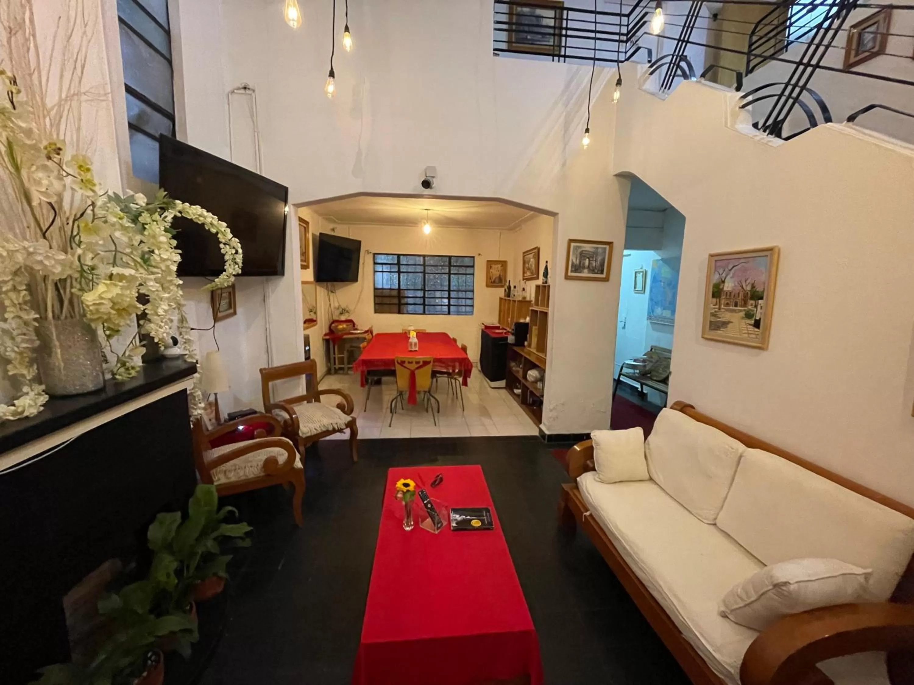 Communal lounge/ TV room, Bed in Hostal Roma Condesa