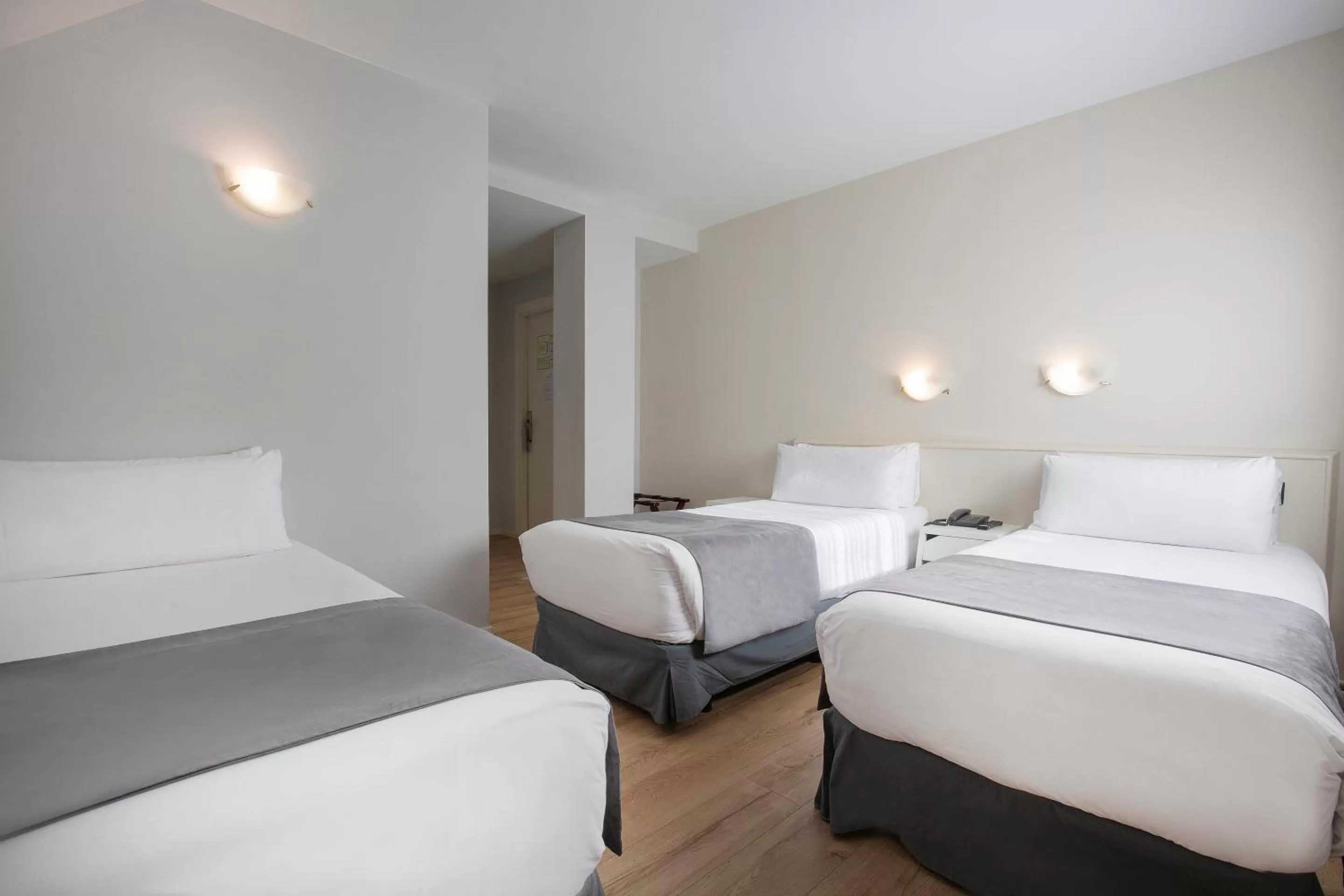 Bed in Hotel Camellot by Nexta