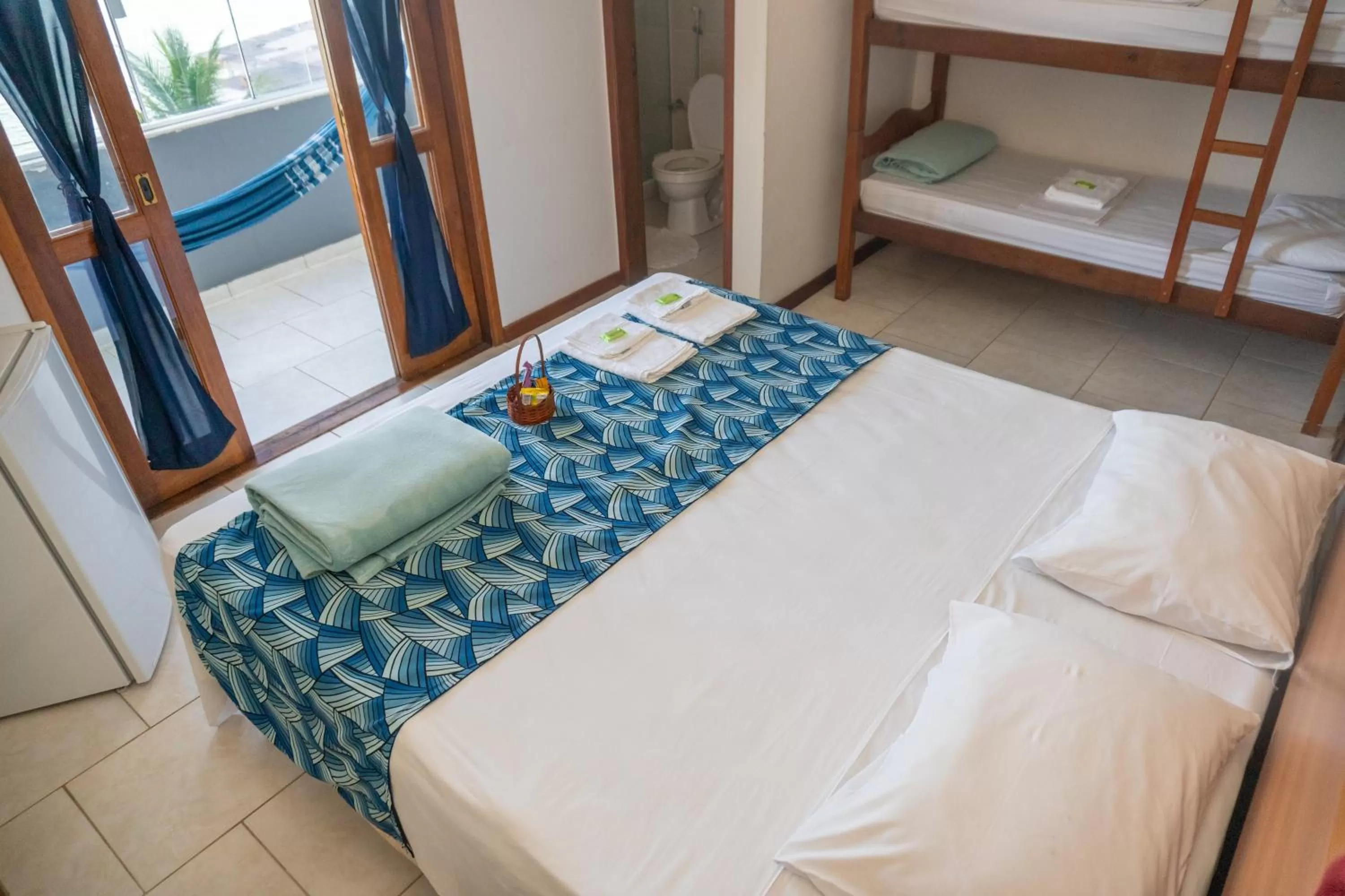 Bed in Pousada Piquara