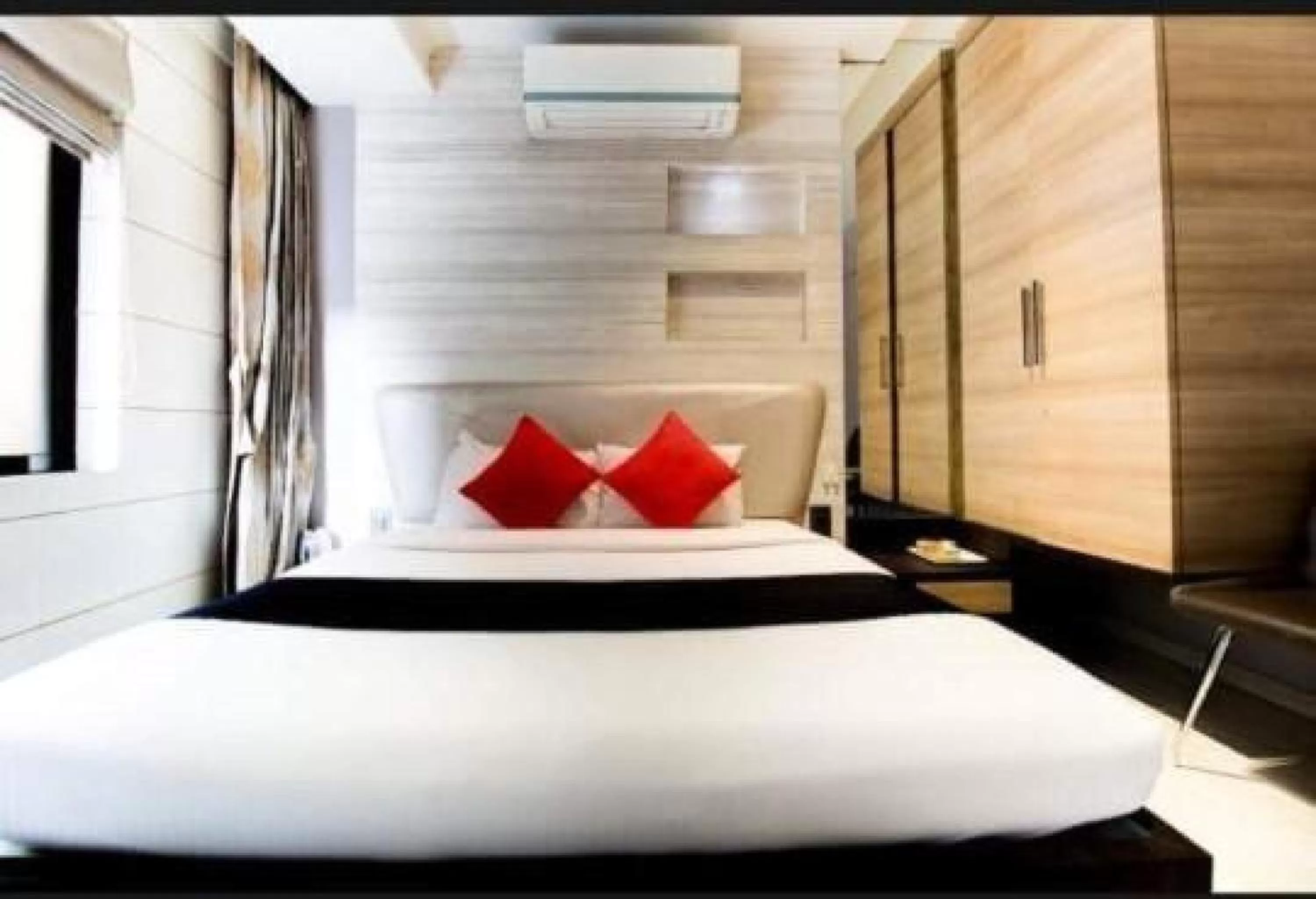 Bed in HOTEL PRATIKSHA RESIDENCY