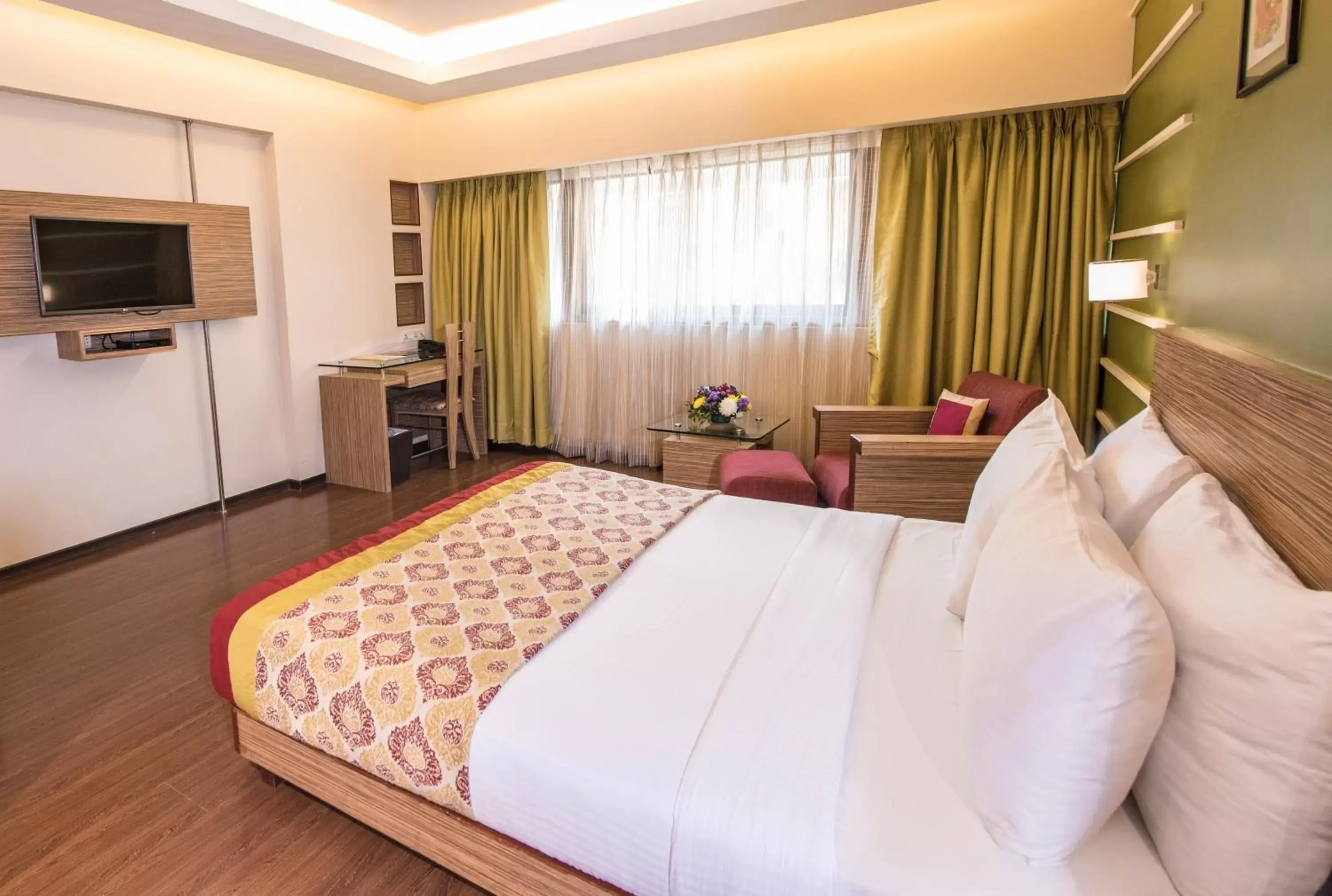 Bed in Hotel Bawa Suites