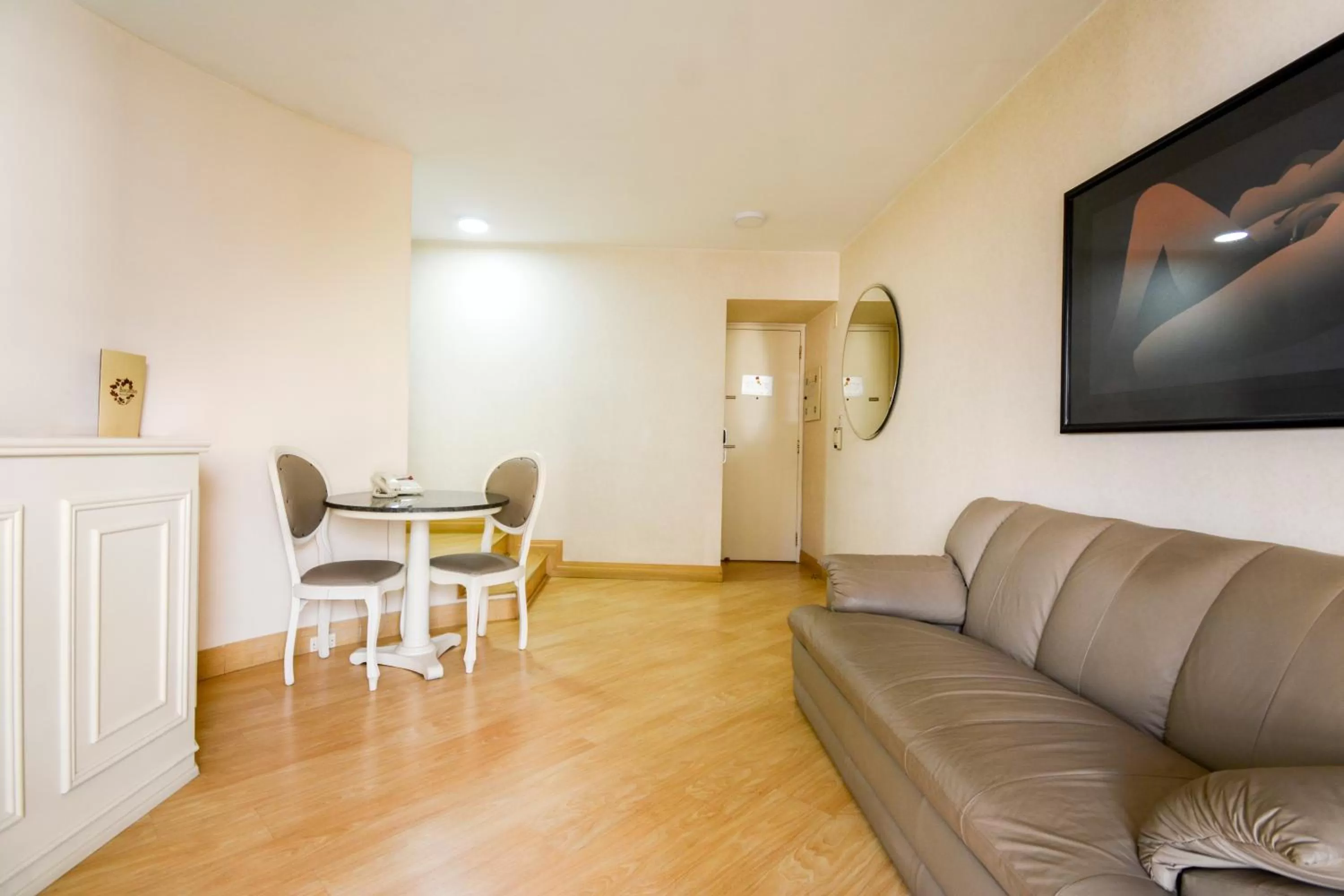 Living room, Seating Area in Wall Street Apartments by BnbHost