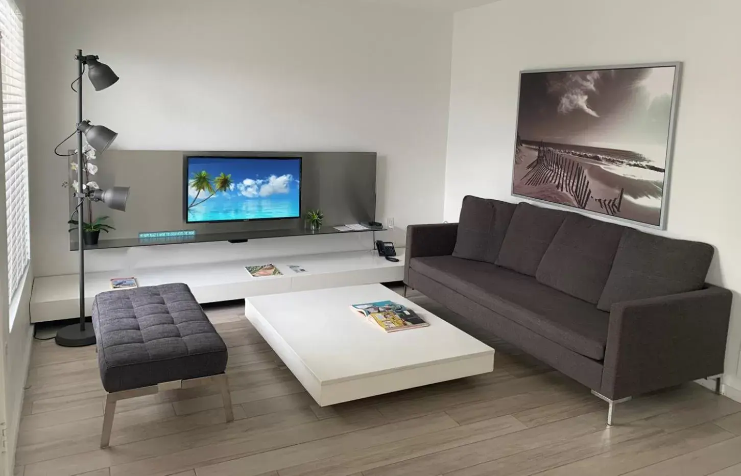 Living room, TV/Entertainment Center in Beach Haus Key Biscayne Contemporary Apartments