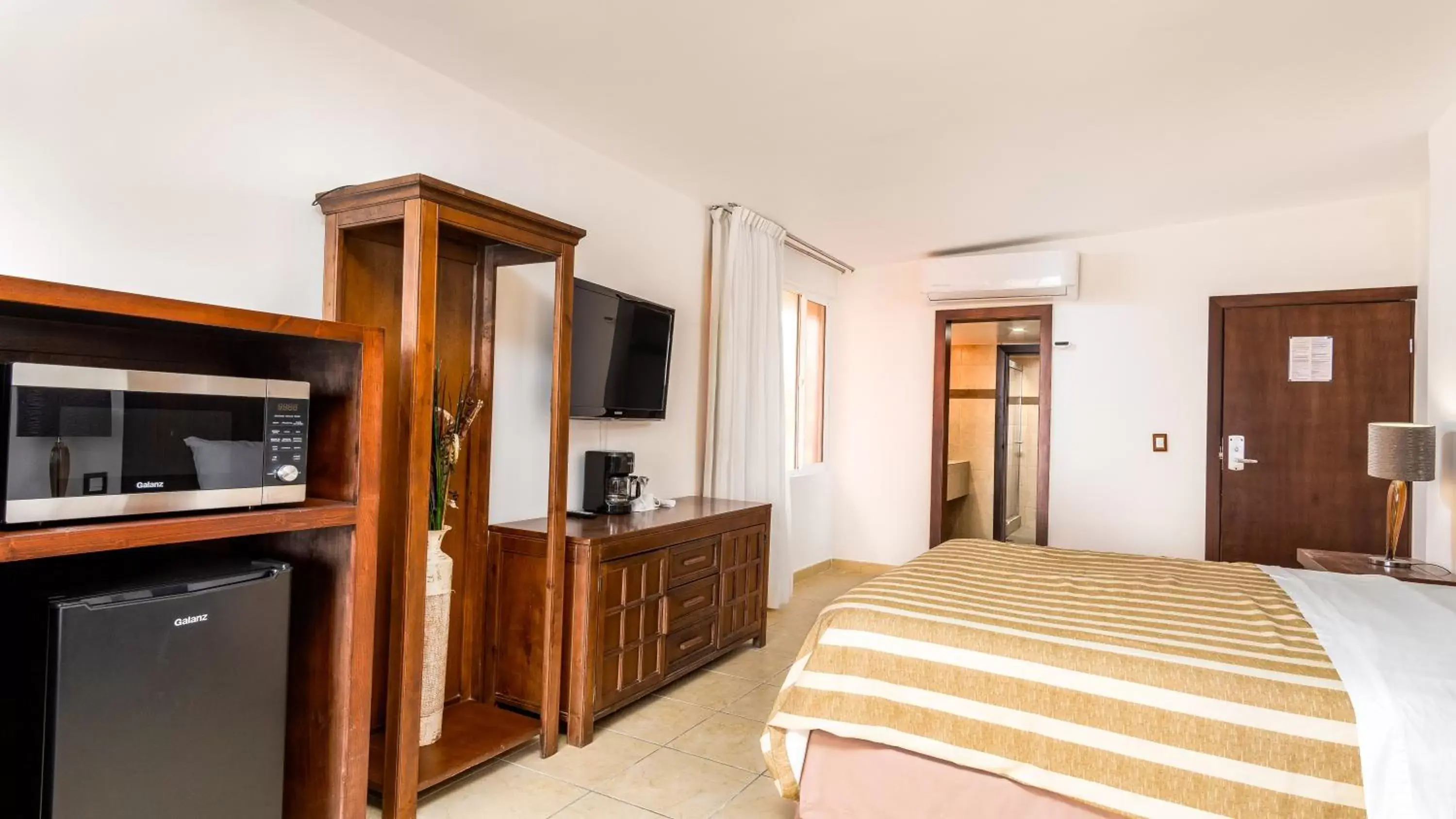 Photo of the whole room, Bed in Puerto Nuevo Baja Hotel & Villas