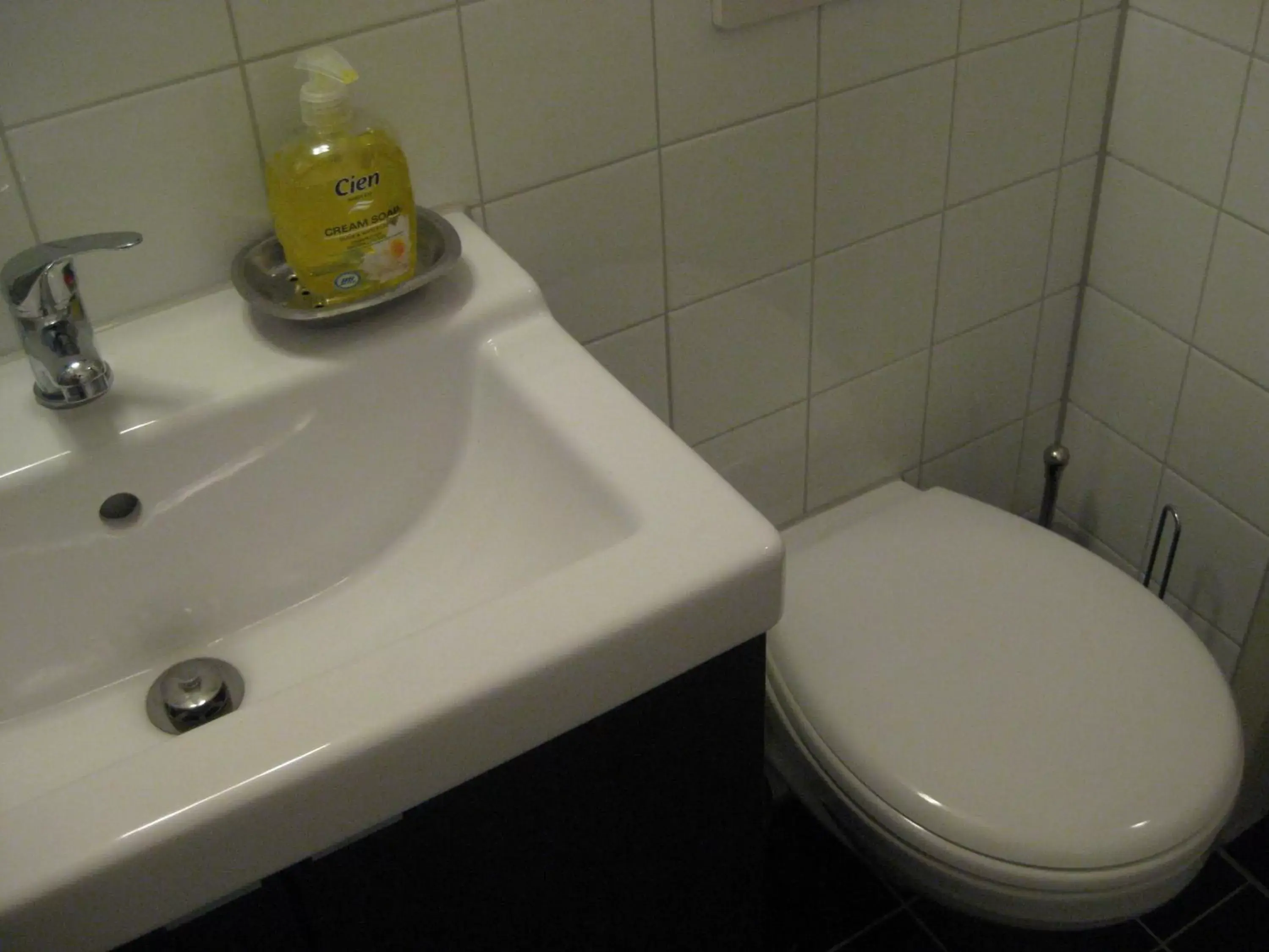 Toilet, Bathroom in Quarenta Studio