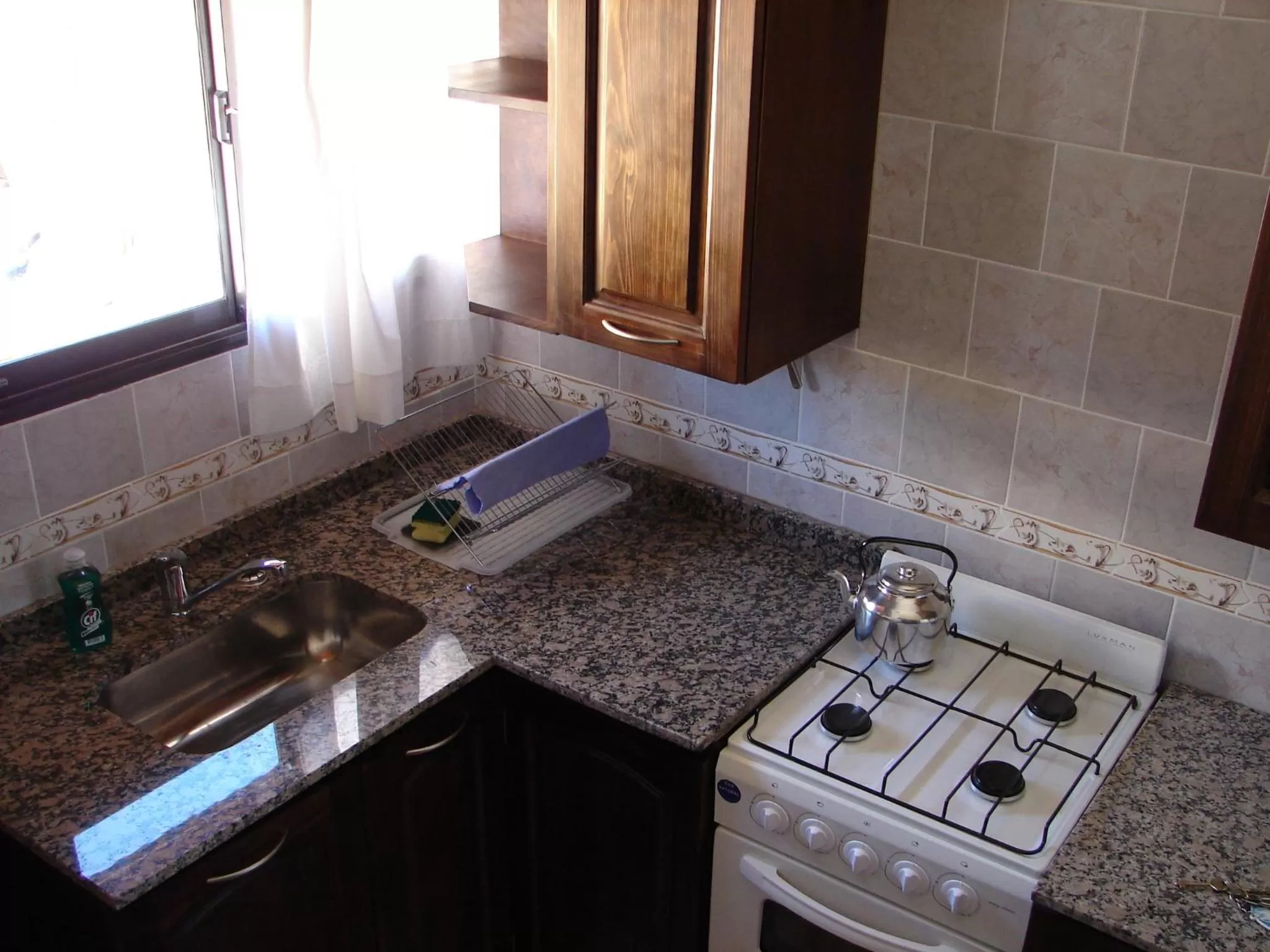 Kitchen or kitchenette in Cabañas Marias del Sur