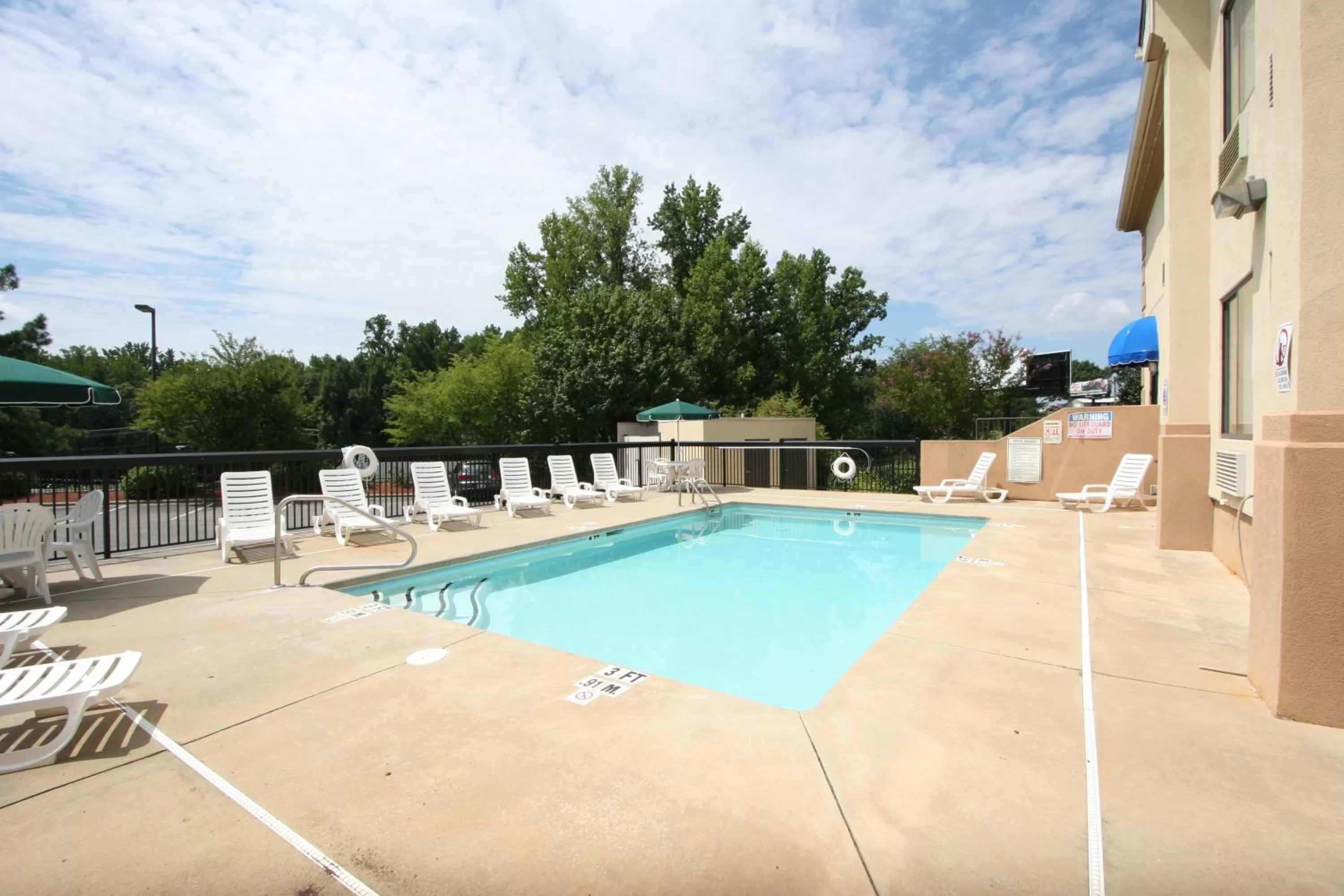 Swimming pool in Country Inn & Suites by Radisson, Shelby, NC