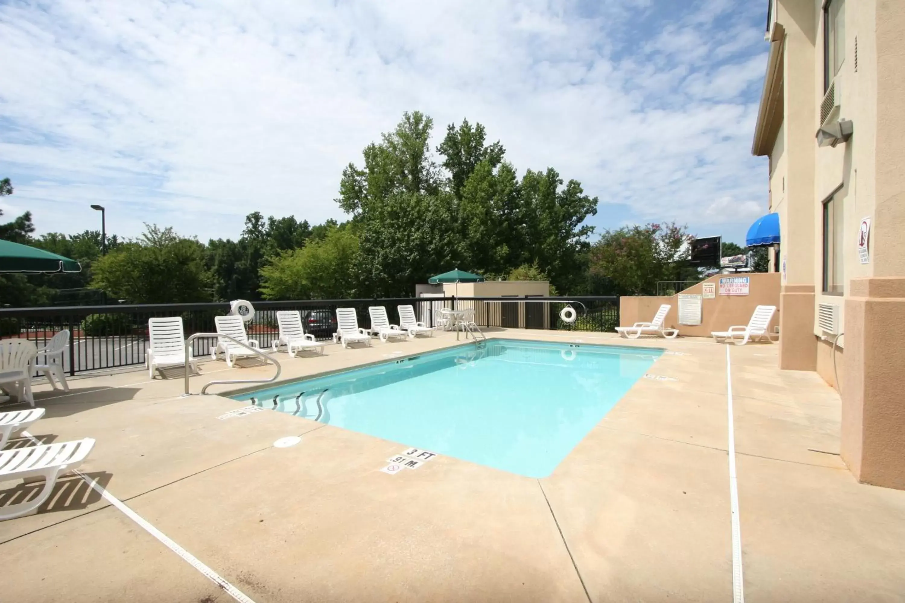 Swimming Pool in Country Inn & Suites by Radisson, Shelby, NC