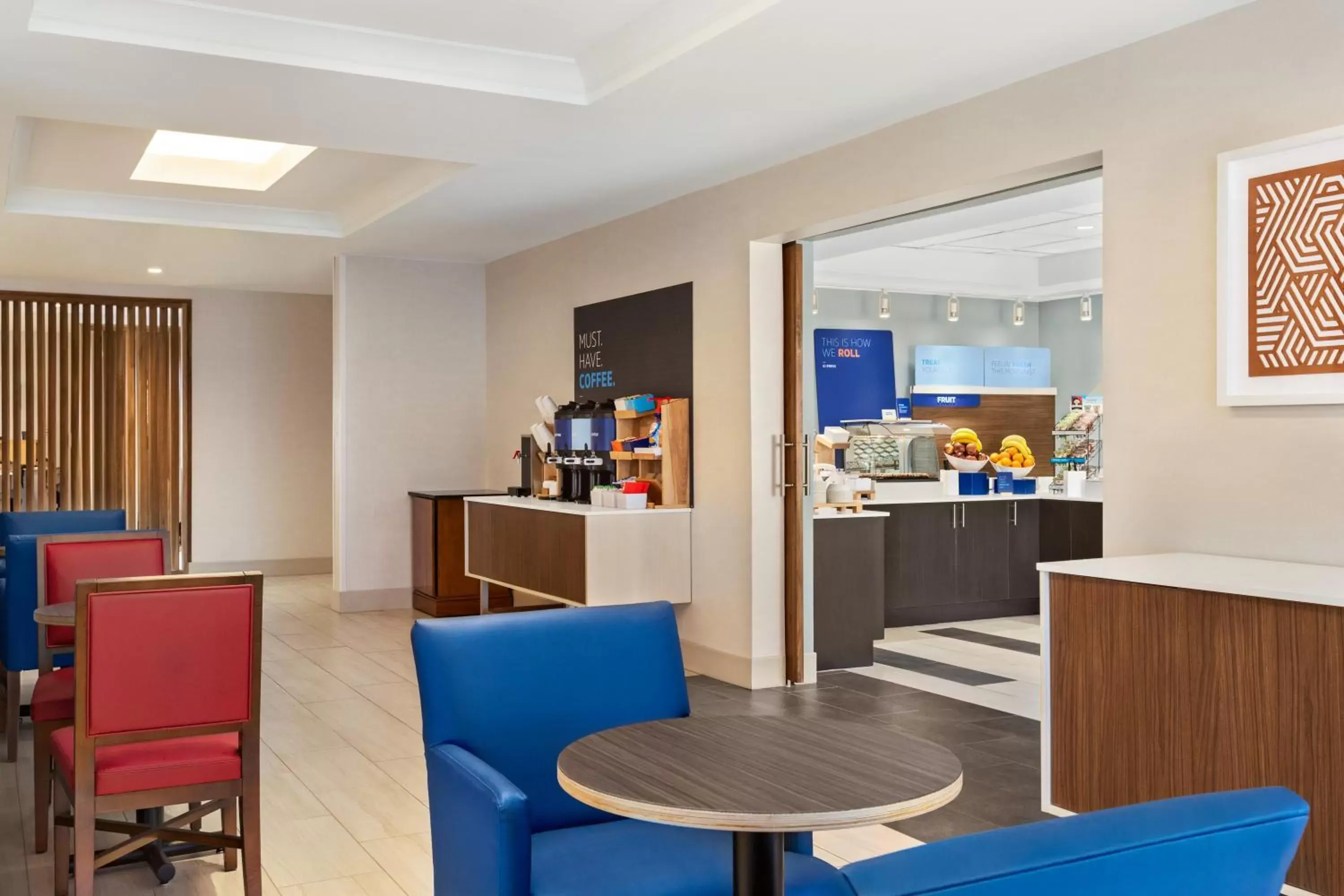 Seating area in Holiday Inn Express & Suites Denver Airport, an IHG Hotel