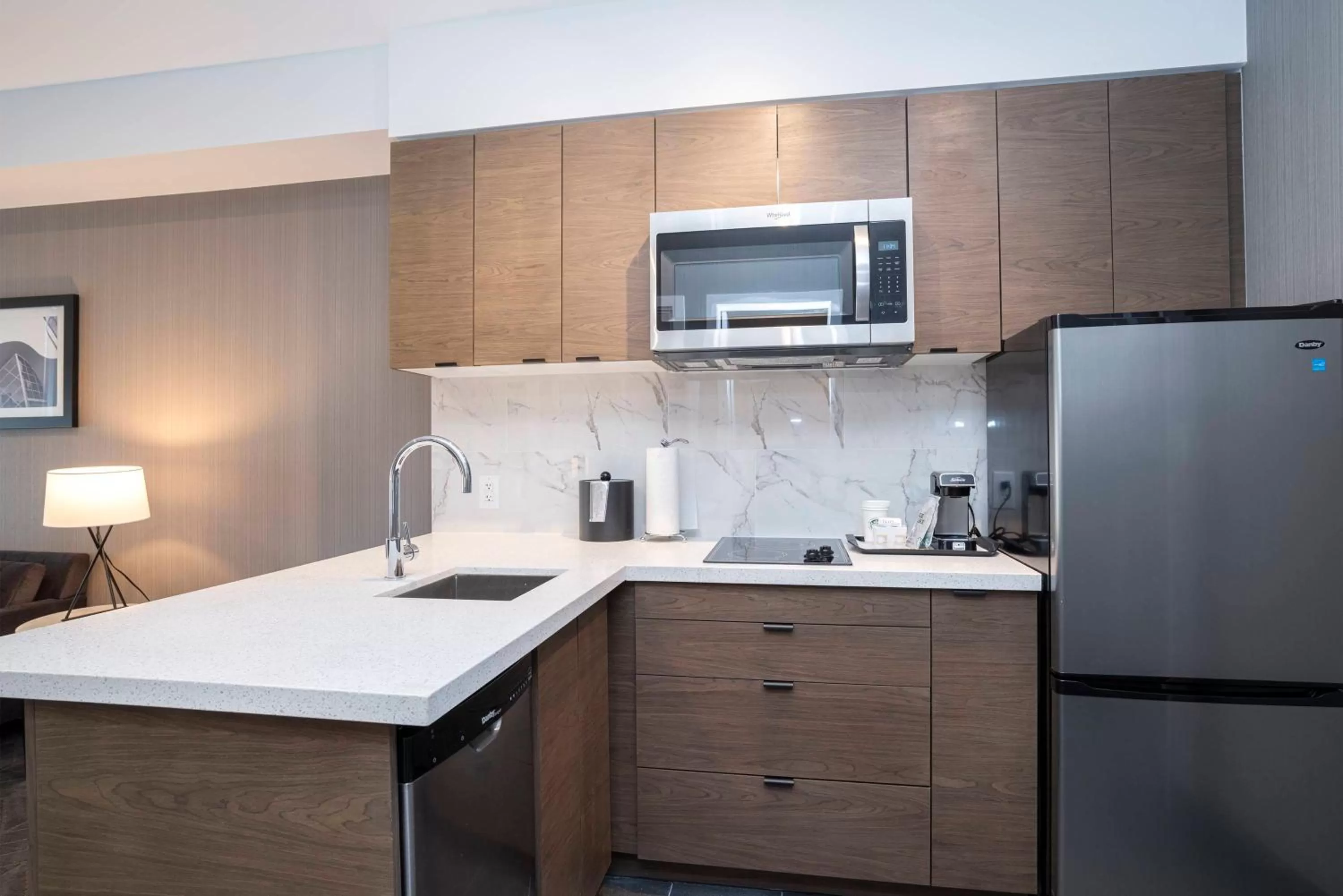 Kitchen or kitchenette in Sandman Signature Sherwood Park Hotel